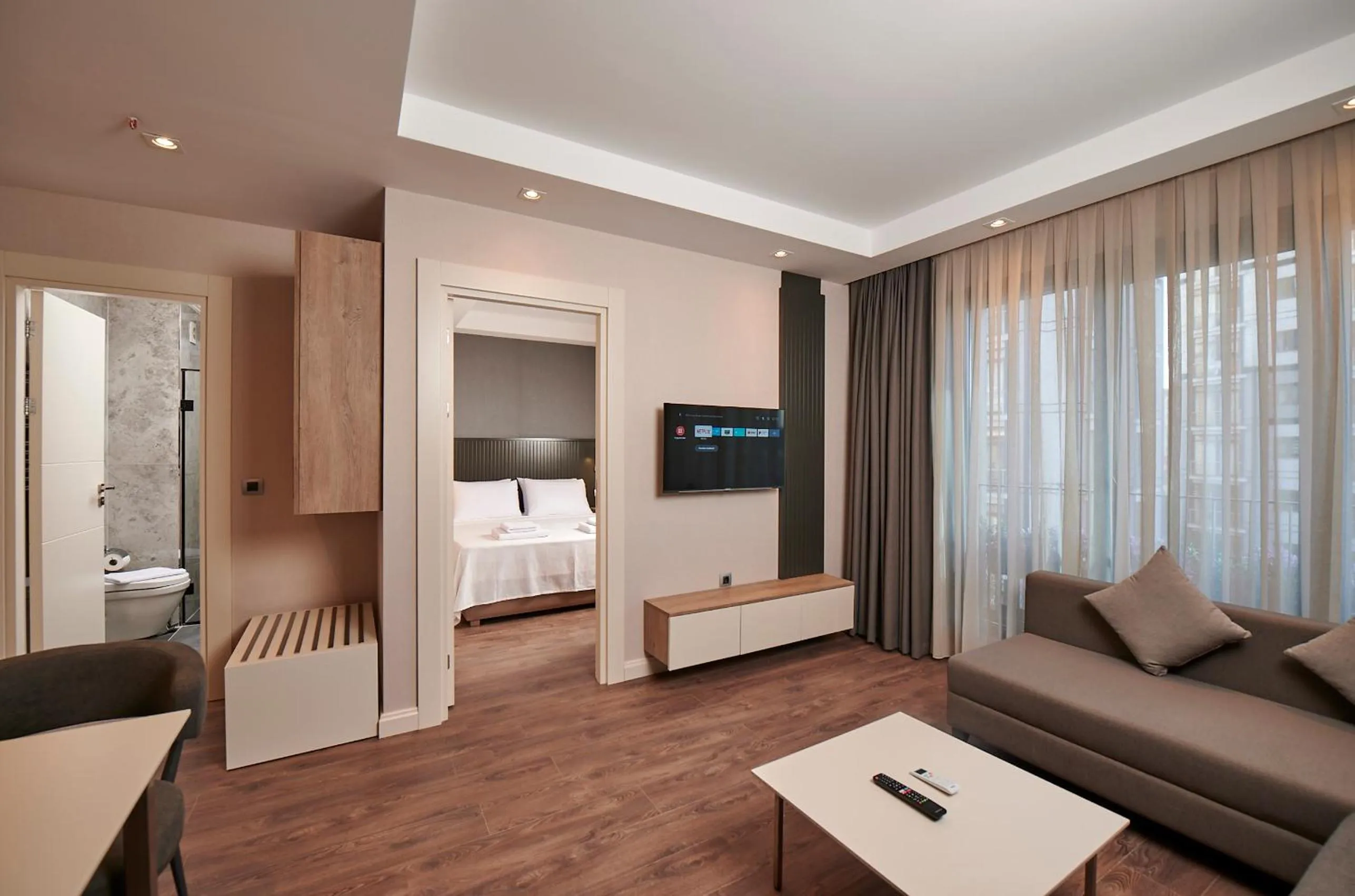 Communal lounge/ TV room, Bed in Livinton İstanbul Ataşehir