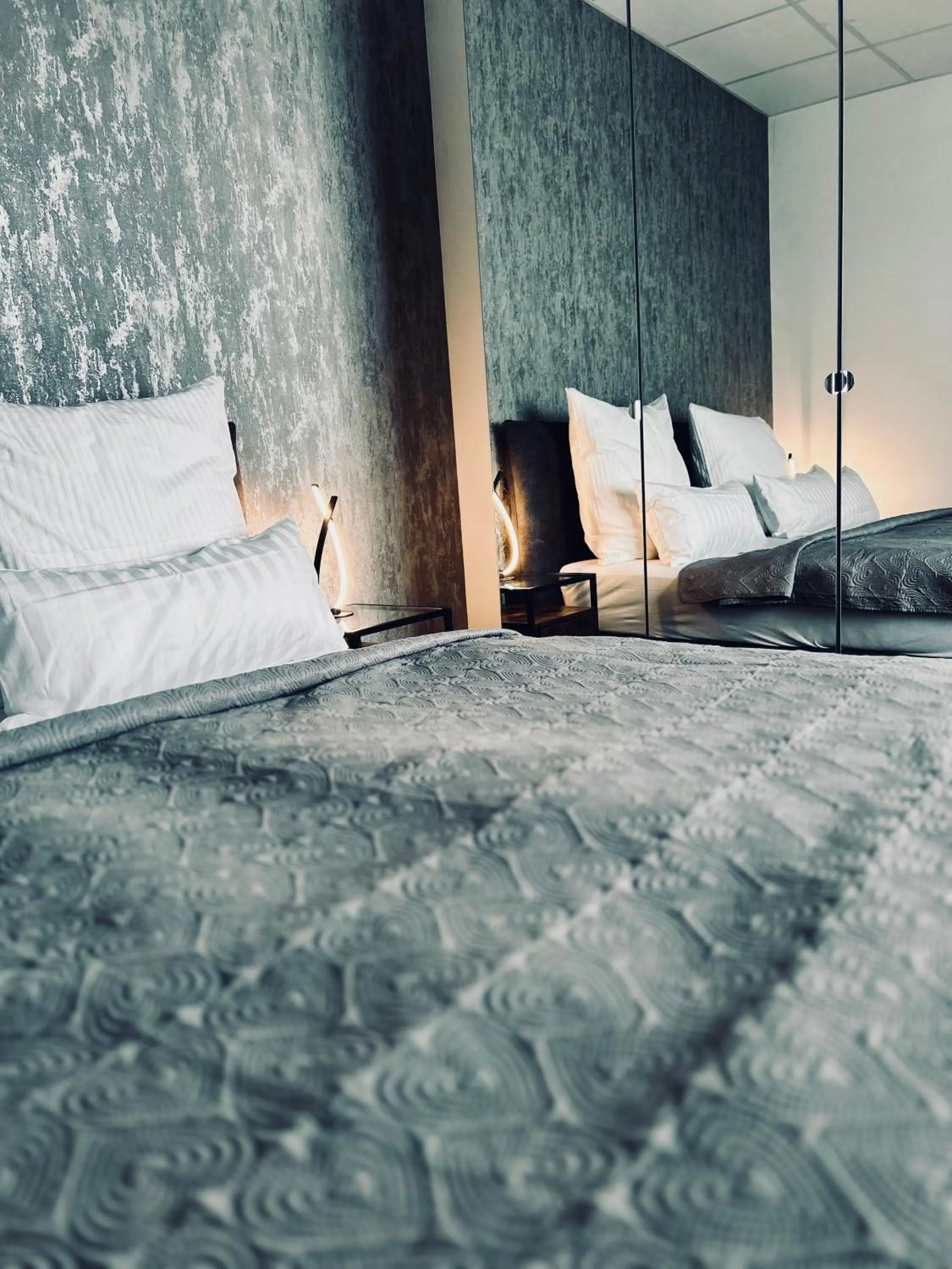 Photo of the whole room, Bed in Firstclass Event & Hotel