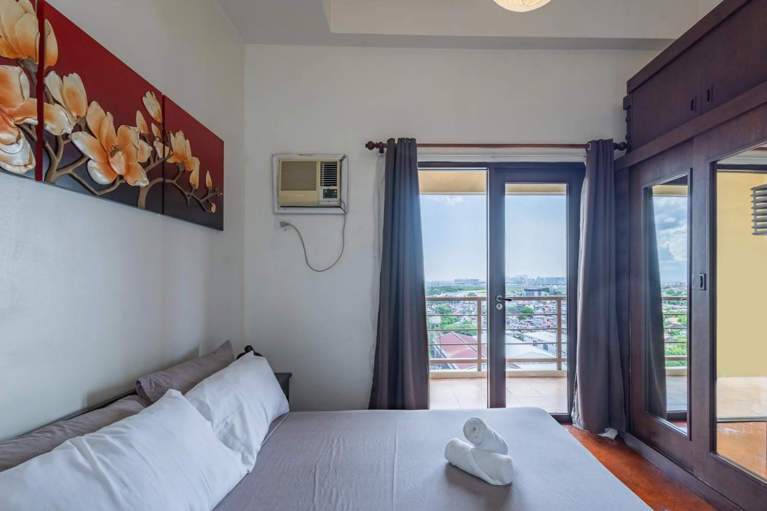 Bed in Spacious Penthouse Near NAIA with 24-7 Convenience