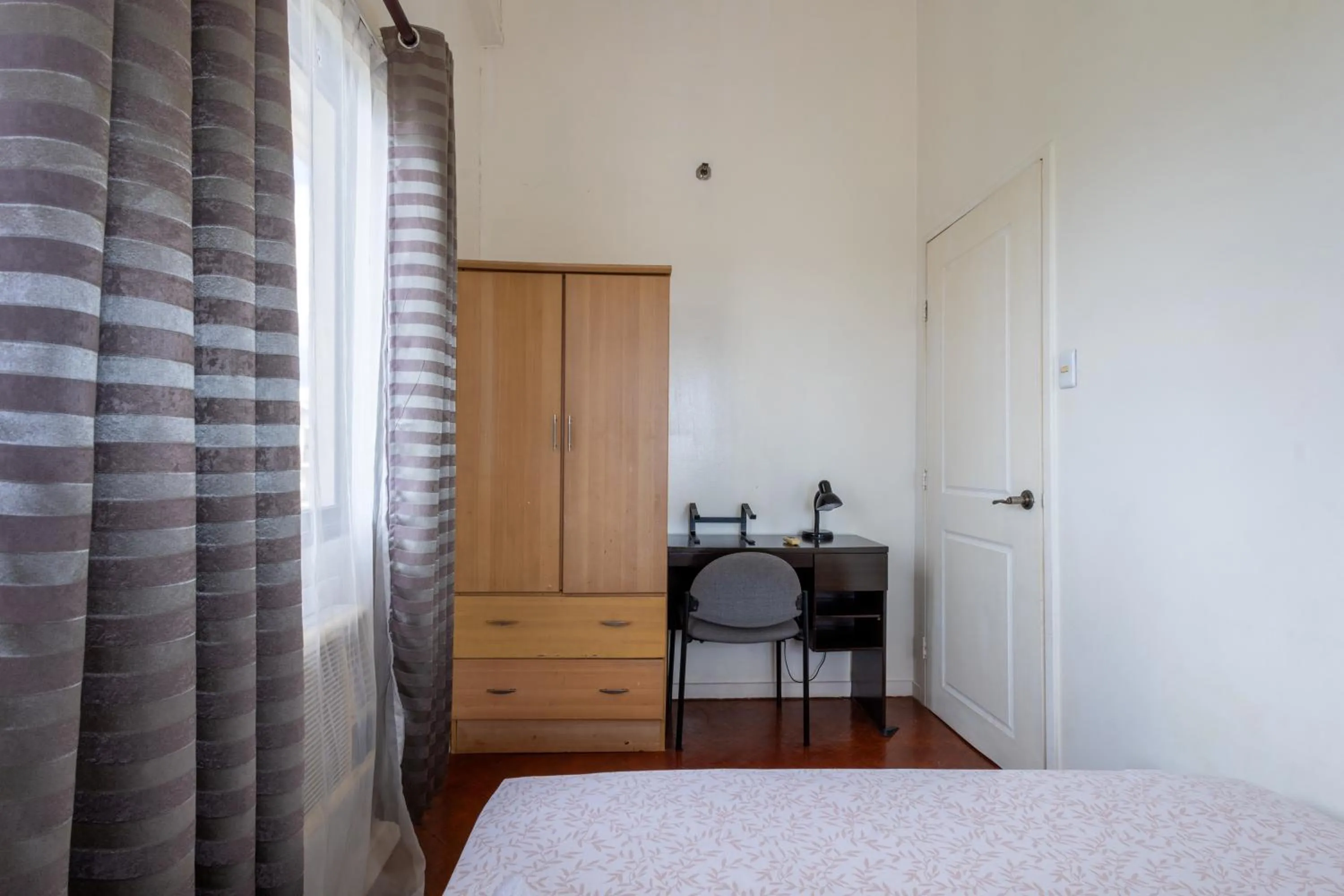 Bed in Spacious Penthouse Near NAIA with 24-7 Convenience