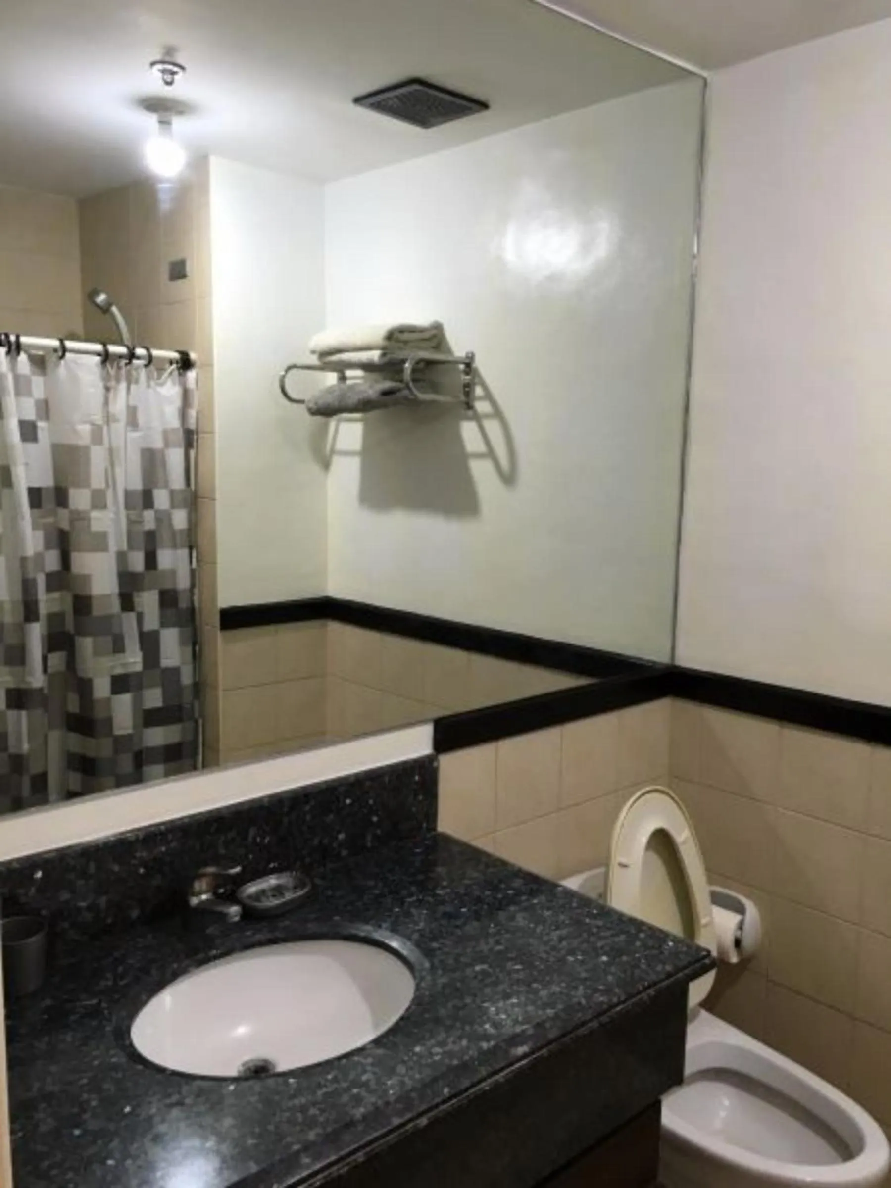 Shower in Spacious Penthouse Near NAIA with 24-7 Convenience