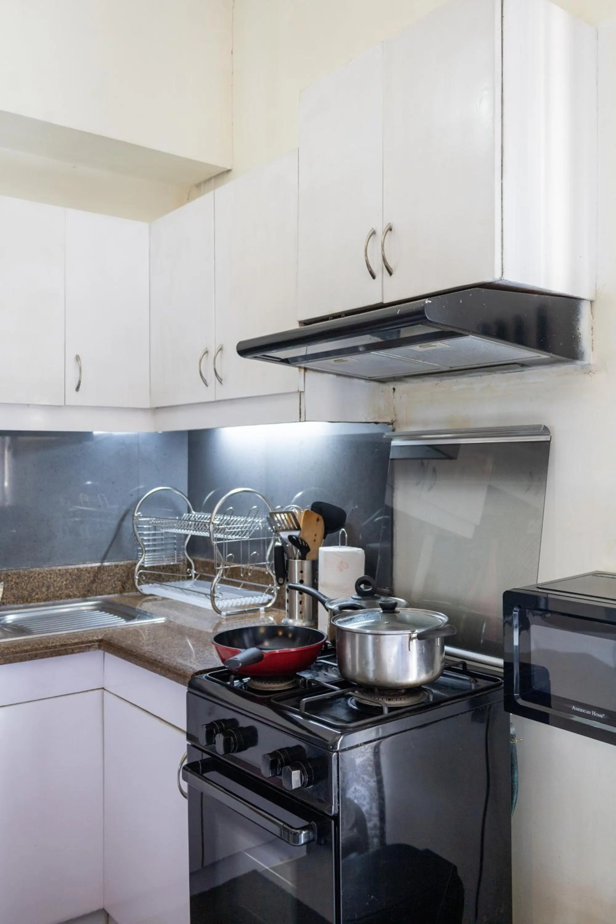 minibar in Spacious Penthouse Near NAIA with 24-7 Convenience