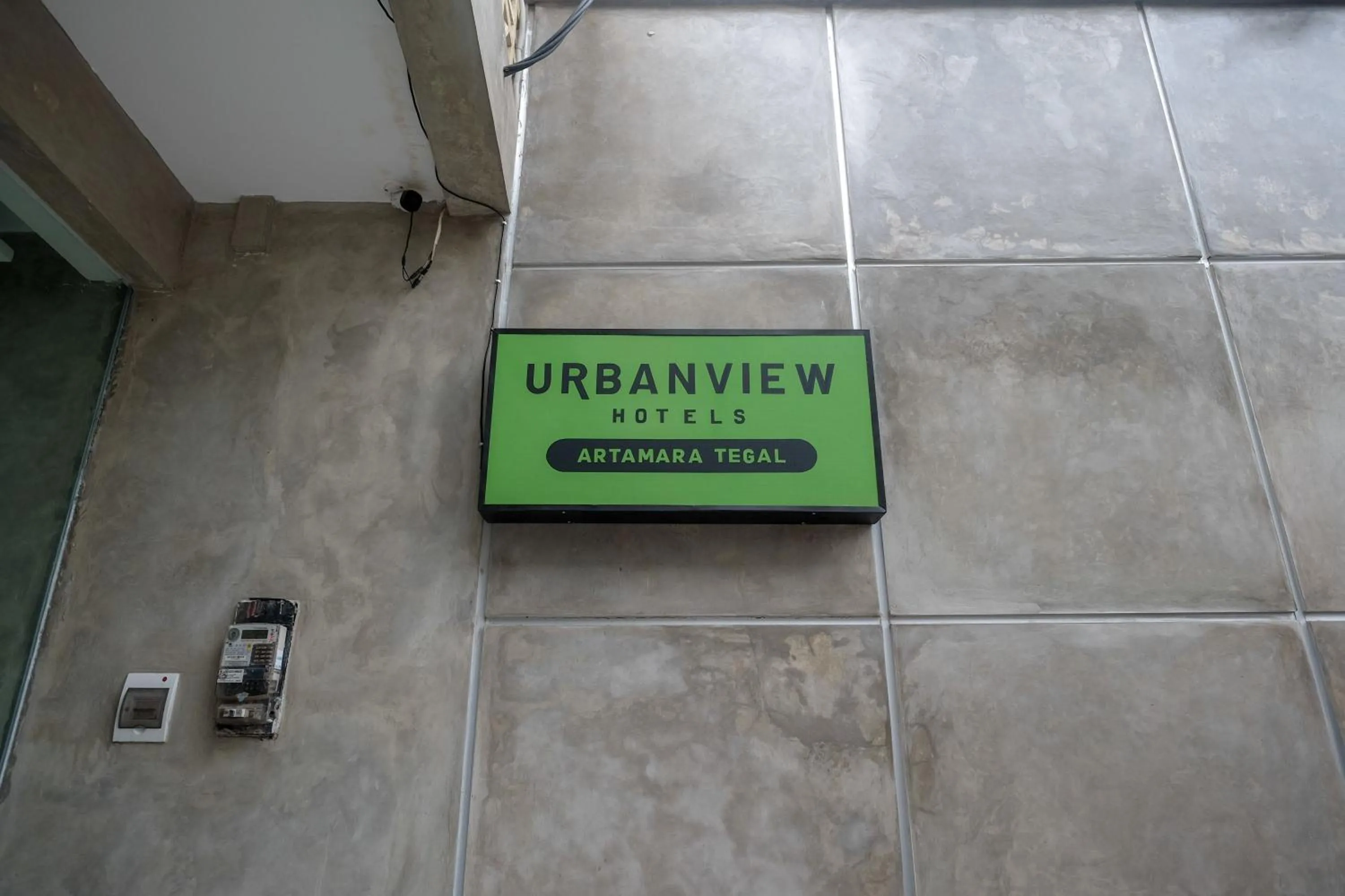Property logo or sign in Urbanview Hotel Syariah Artamara Tegal by RedDoorz