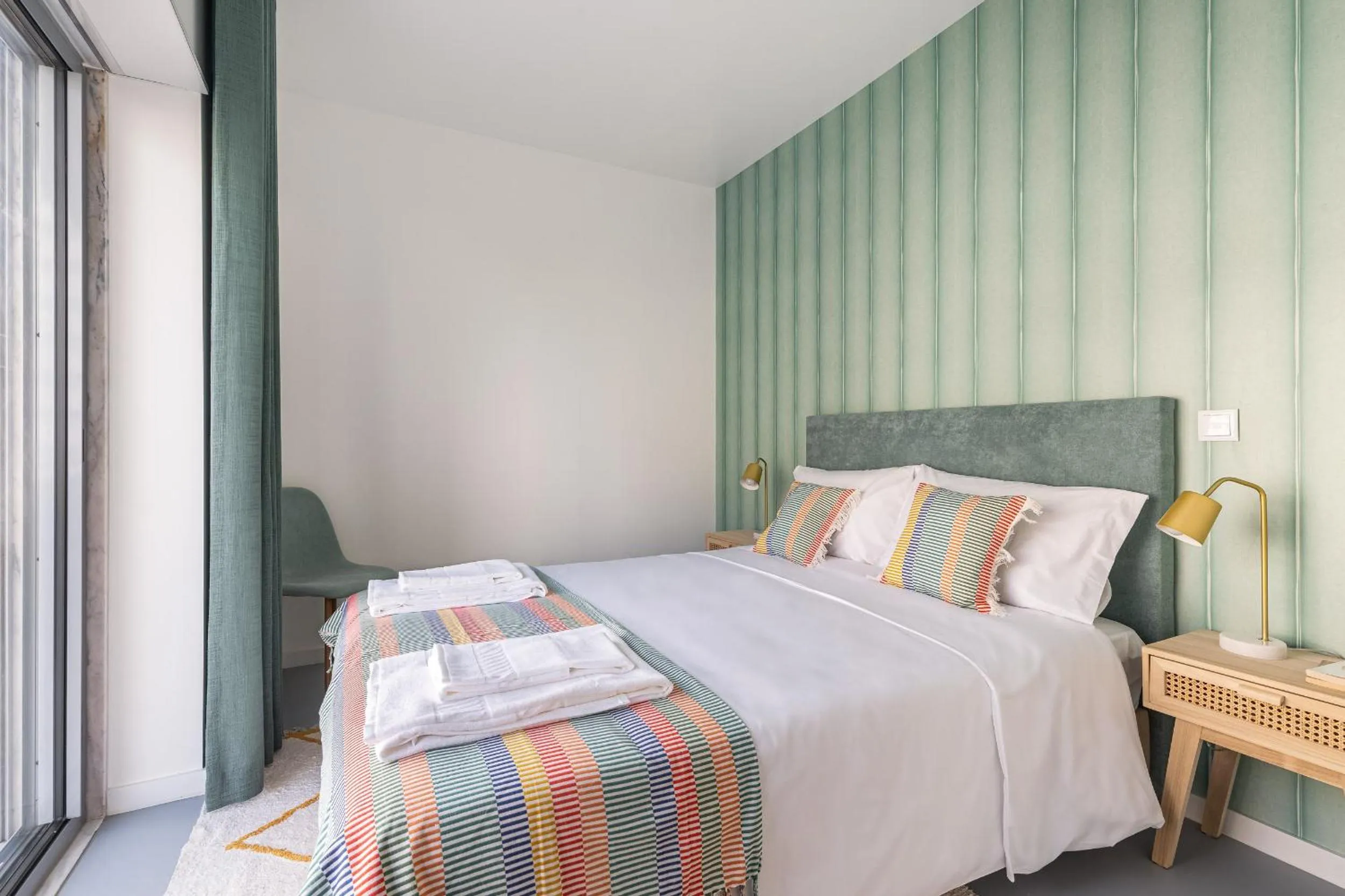 Bed in Succeed Campo Pequeno Apartments