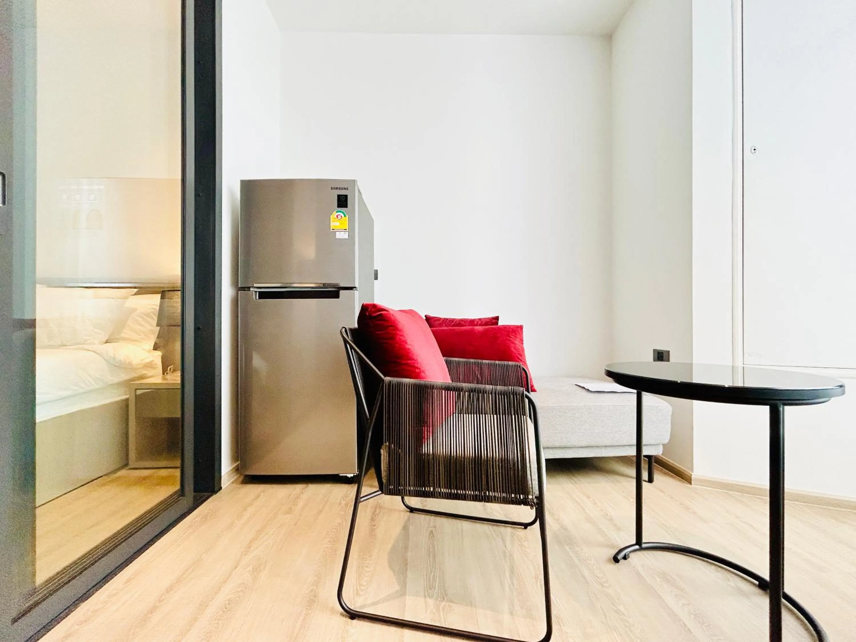 Living room, Bed in Edge Central Pattaya By YoYo