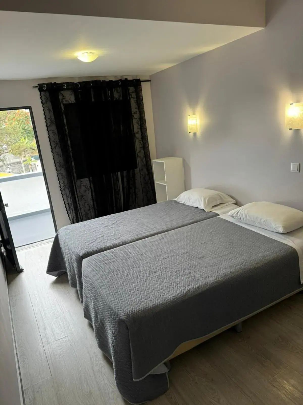 Twin Room with Balcony - single occupancy in Alojamento Central I - Funchal Twin Room with Balcony - single occupancy in Alojamento Central I - Funchal