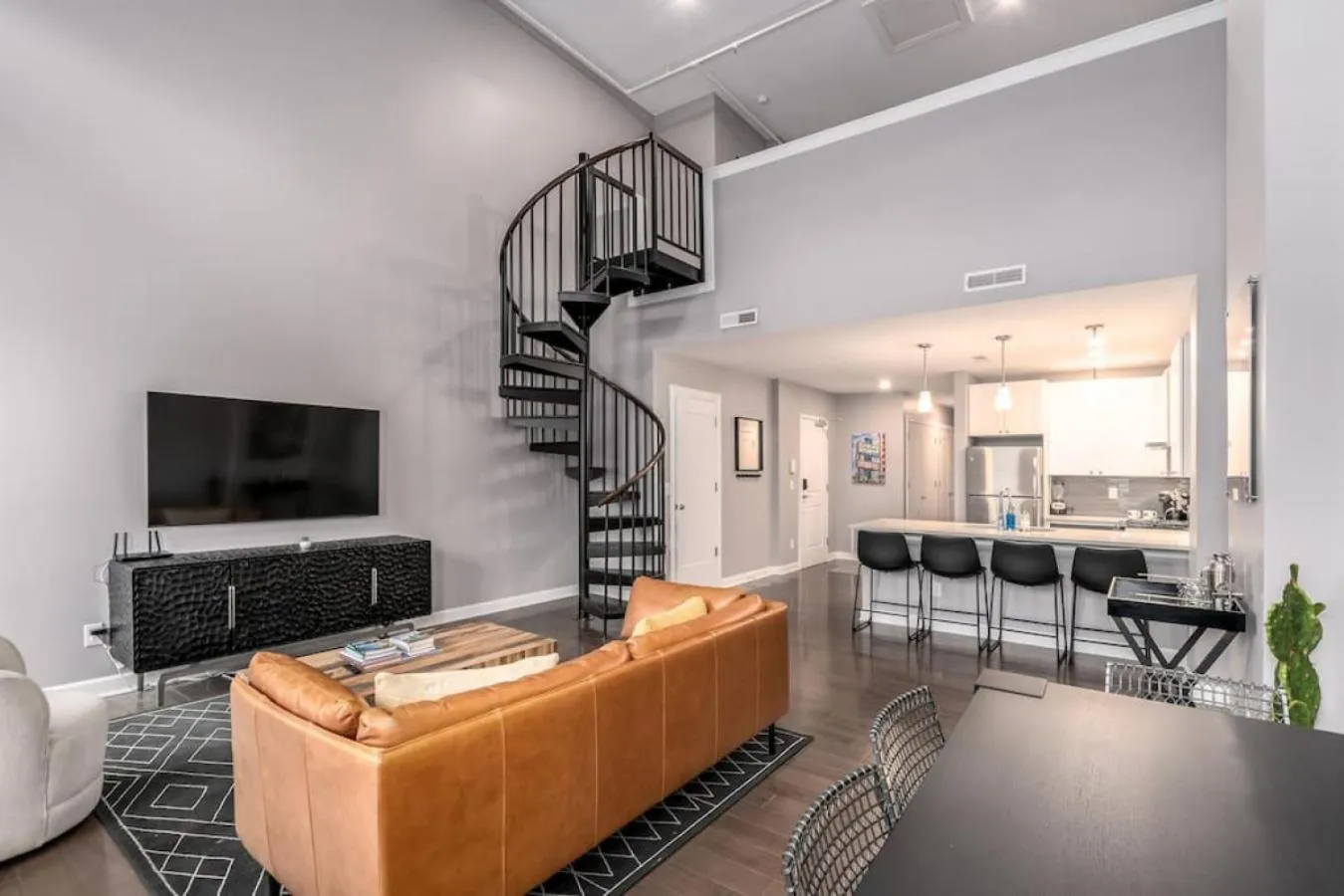 Living room in Soaring 2-Bedroom Parkside Loft Walkable to it All