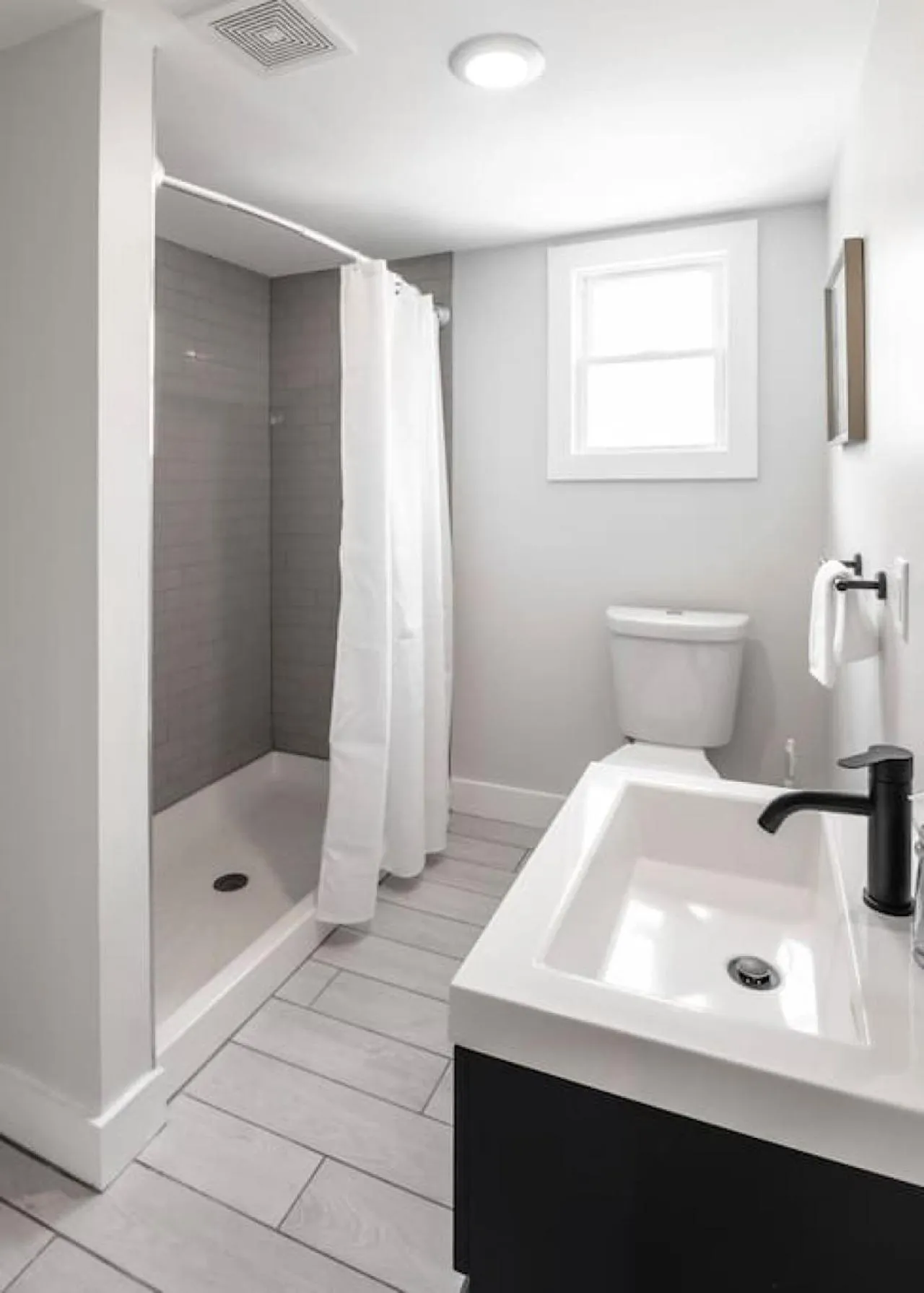 Bathroom in Deluxe 4-Bedroom w Huge Deck 3-Min to Downtown