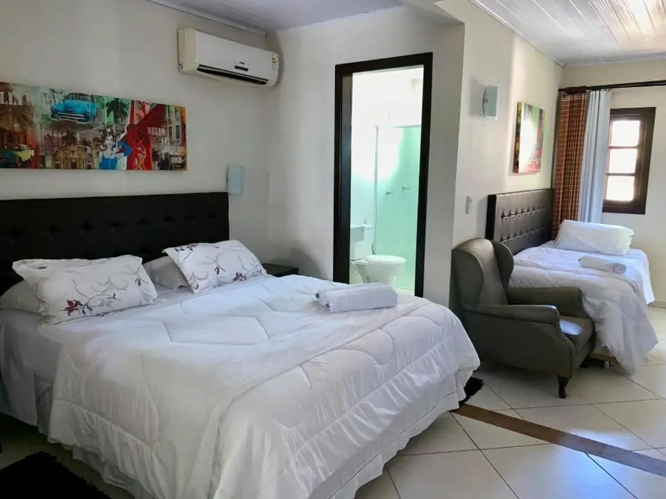 Bed in Pousada Solar dos Girassóis