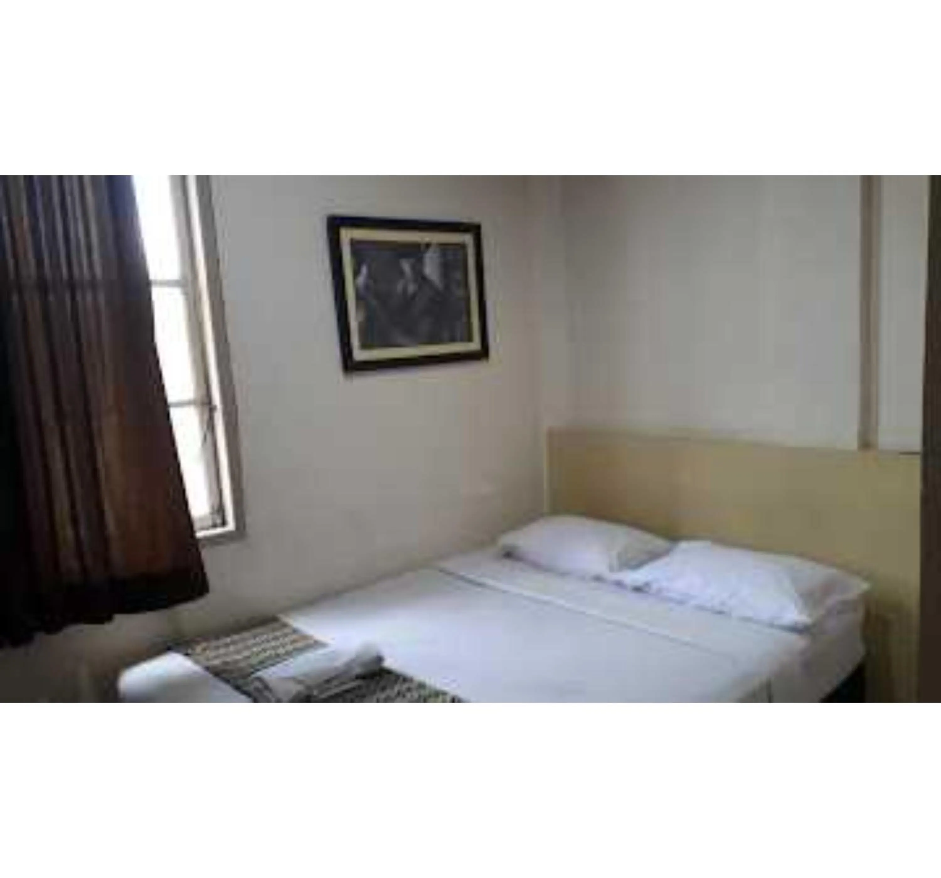 Bedroom, Bed in EXPRESS O 91674 Penginapan Bm Prima