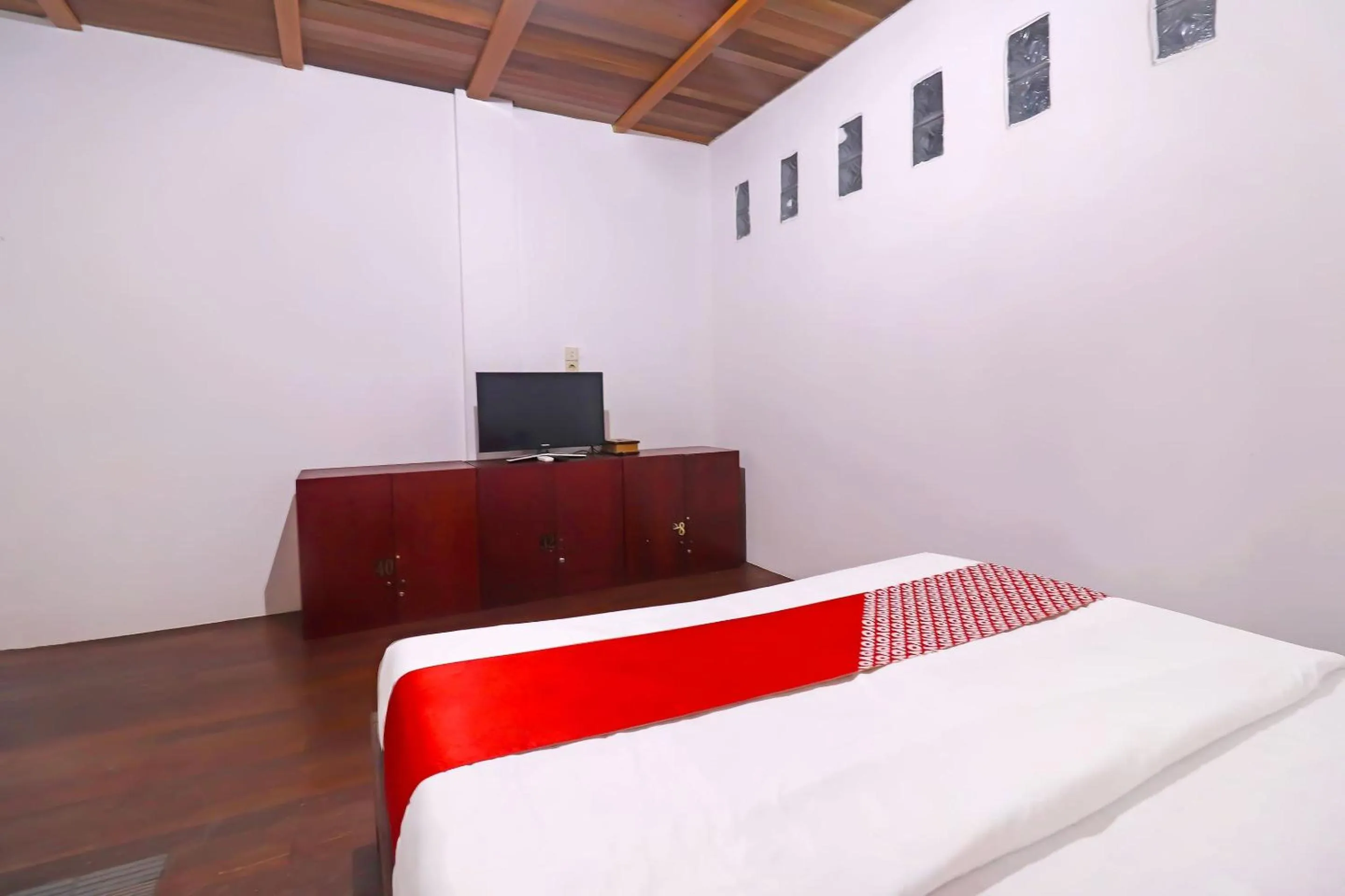 Bedroom in OYO 91807 Kemalasari Guesthouse