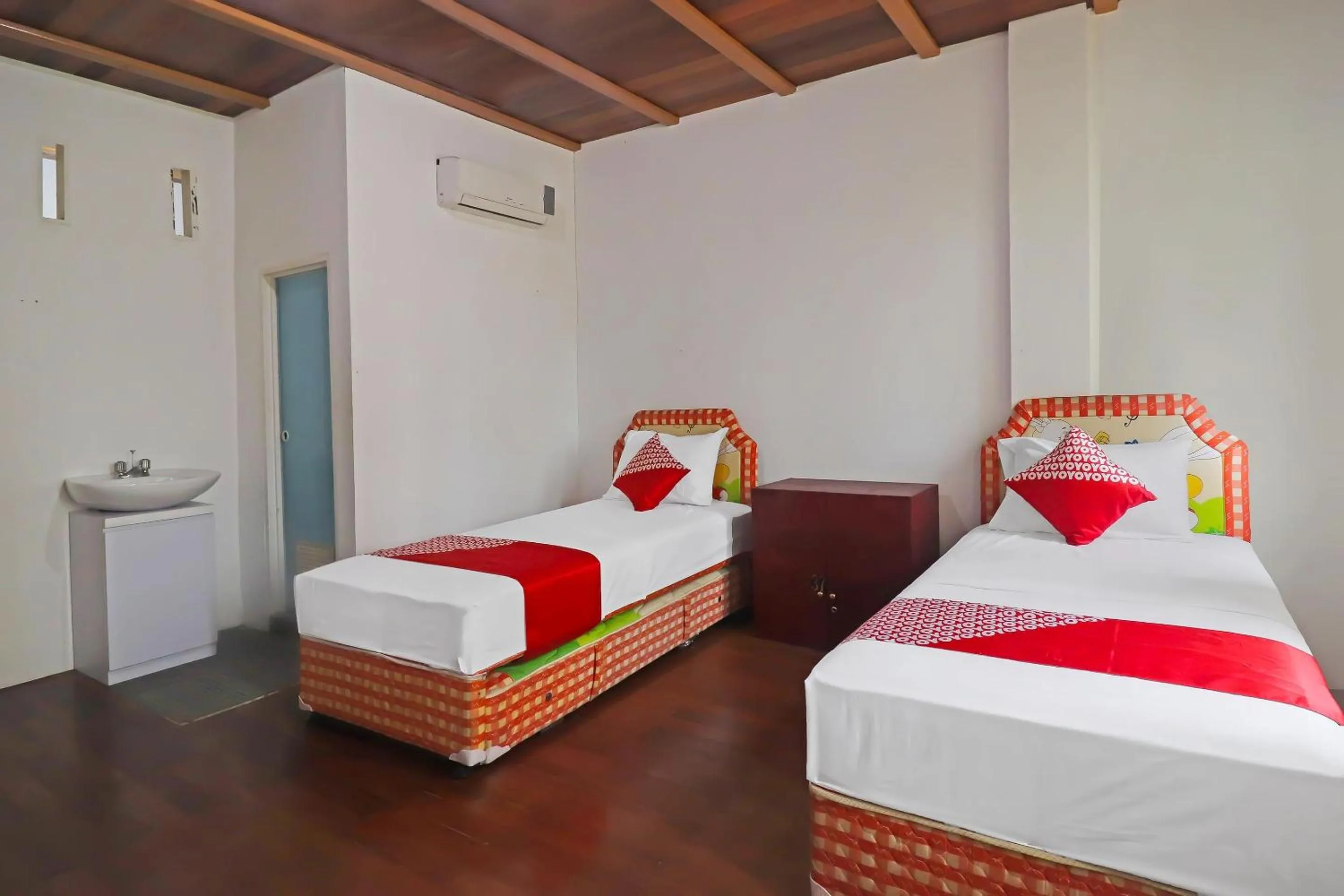 Bedroom in OYO 91807 Kemalasari Guesthouse