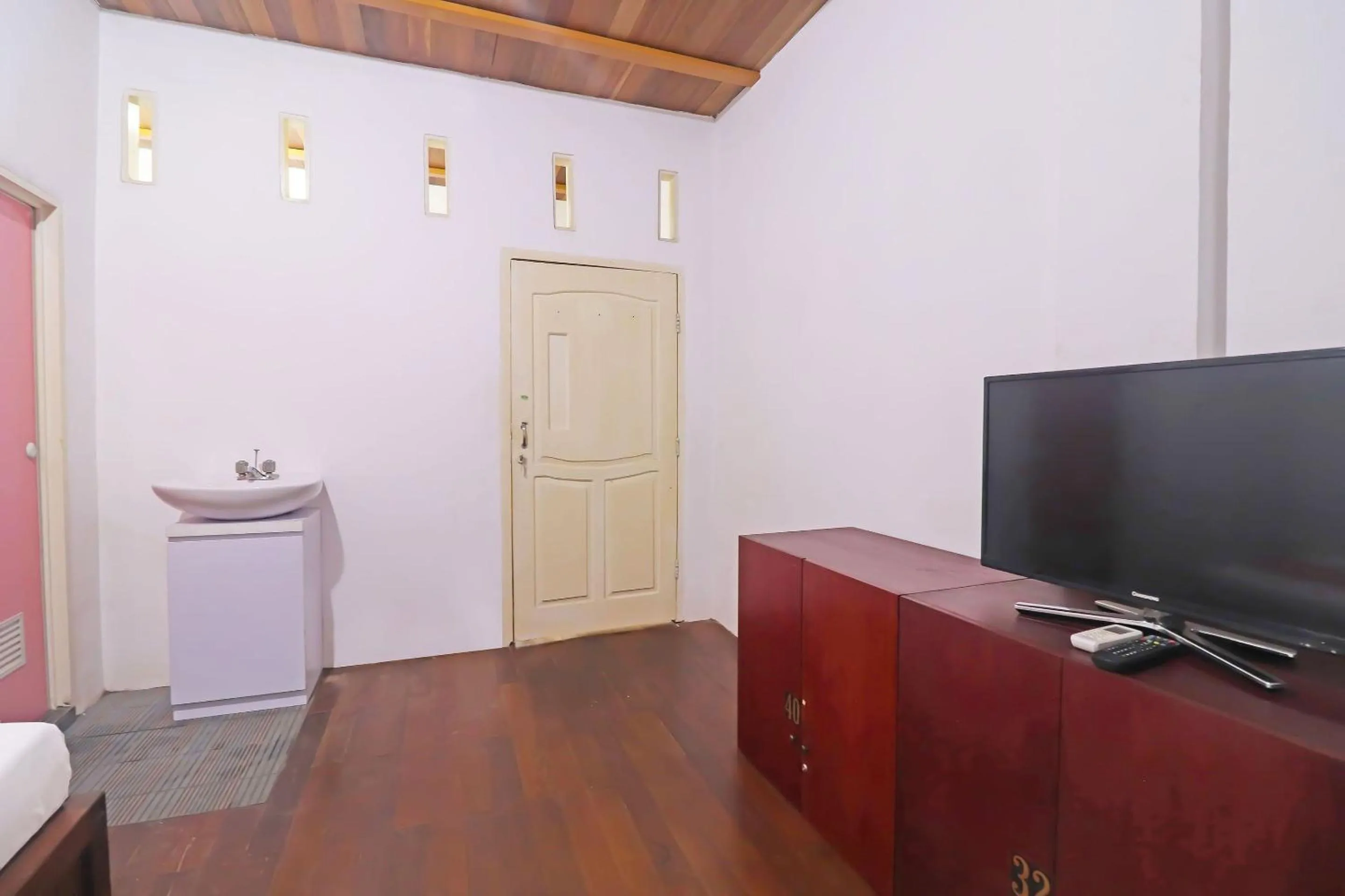 Bedroom in OYO 91807 Kemalasari Guesthouse