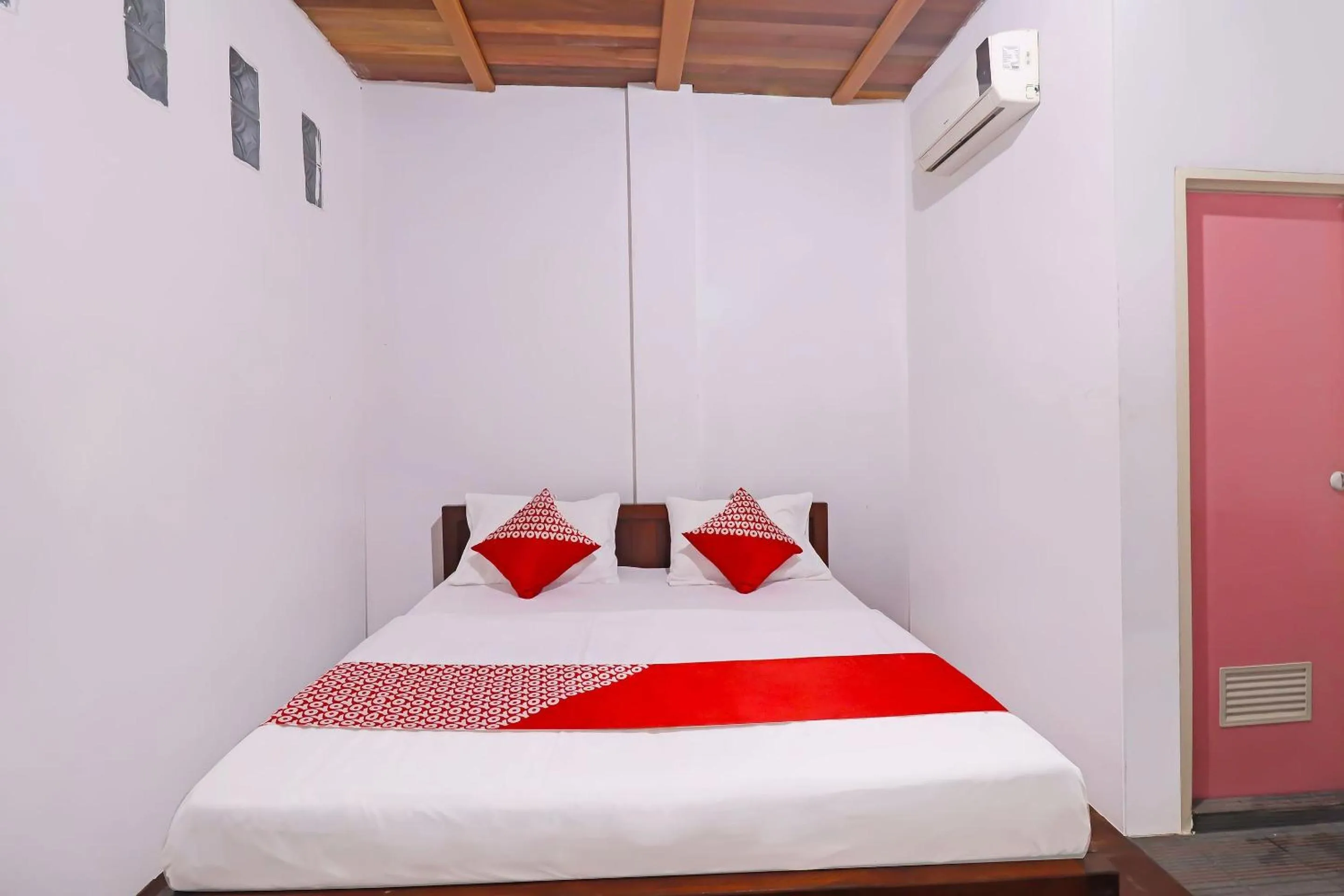 Bedroom in OYO 91807 Kemalasari Guesthouse