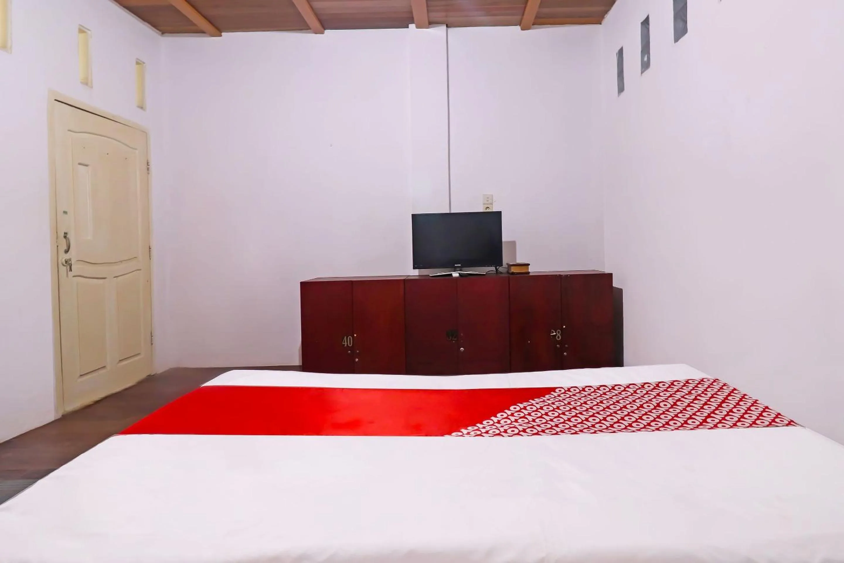 Bedroom in OYO 91807 Kemalasari Guesthouse