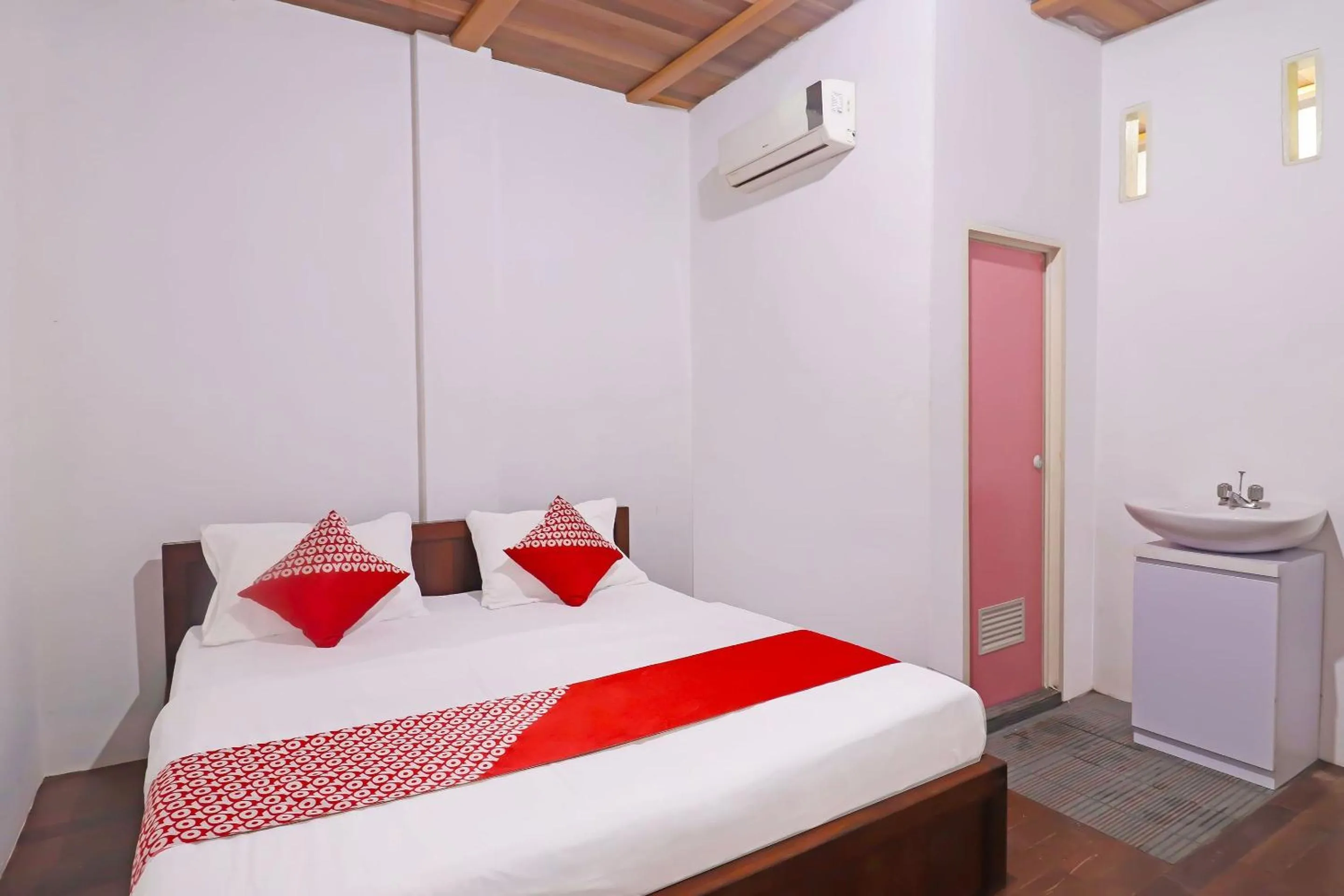 Bedroom in OYO 91807 Kemalasari Guesthouse