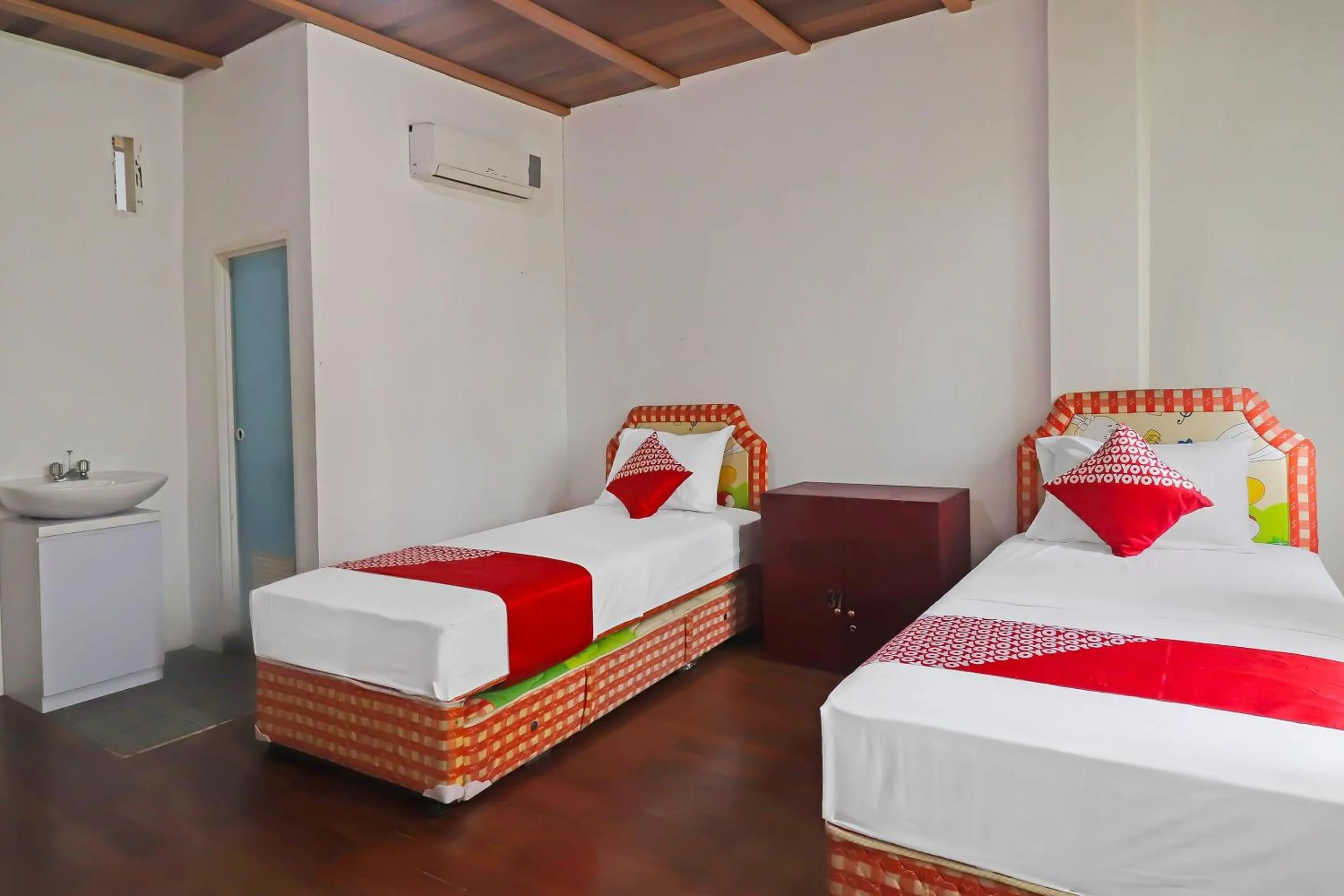 Bedroom in OYO 91807 Kemalasari Guesthouse