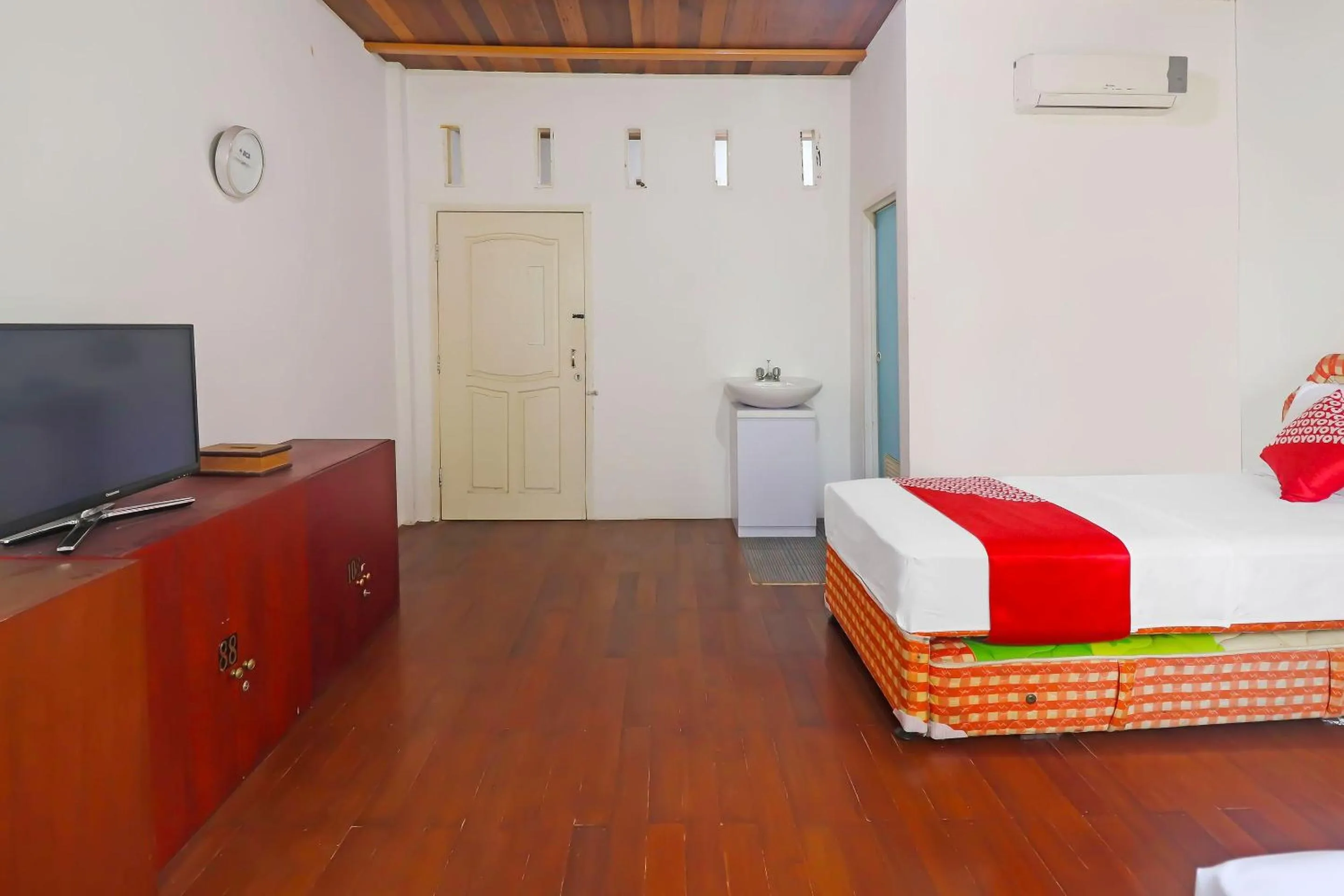 Bedroom in OYO 91807 Kemalasari Guesthouse