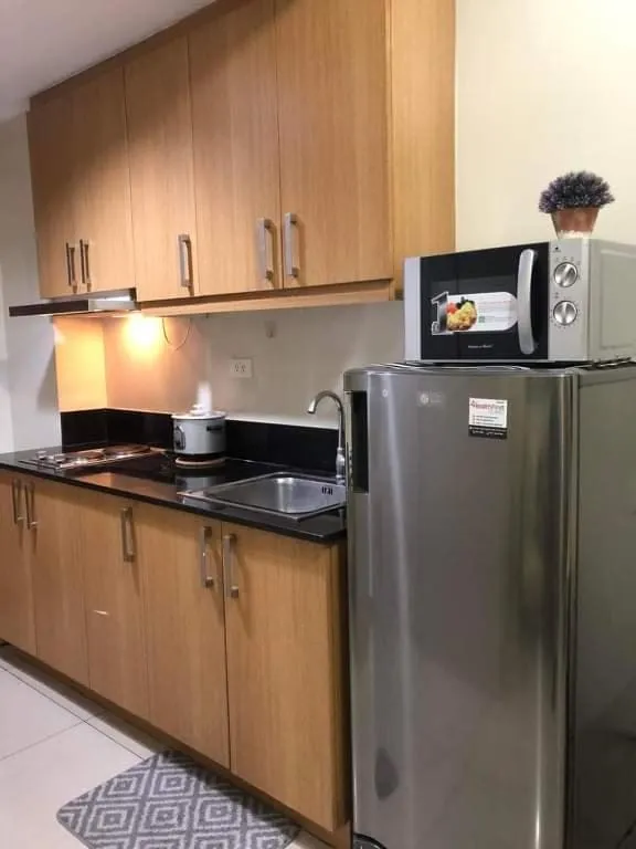 Shell Residences Homey Condo by DNJ