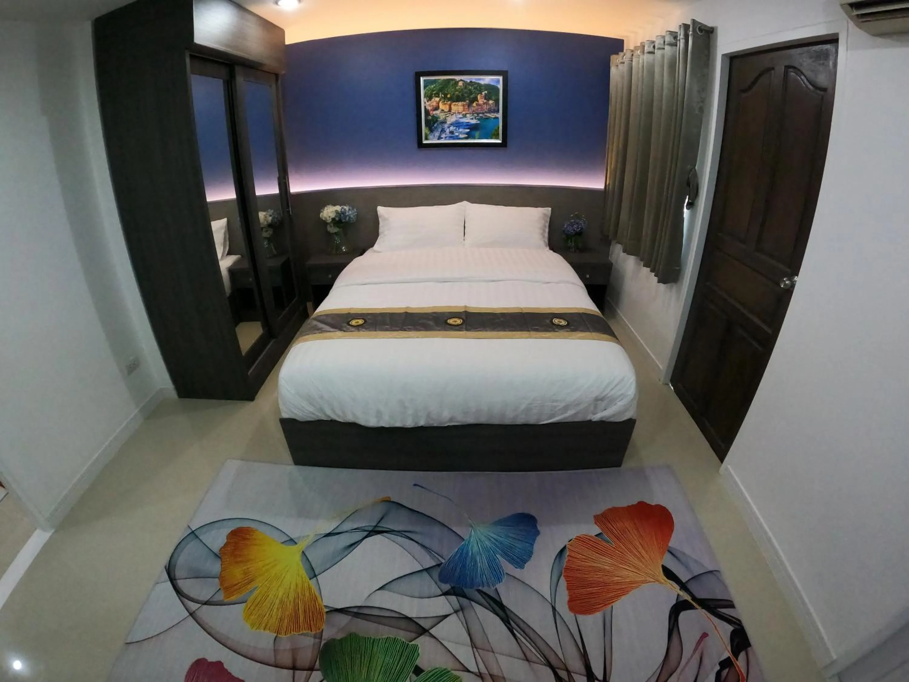 Bed in Poonsuk Place Hotel