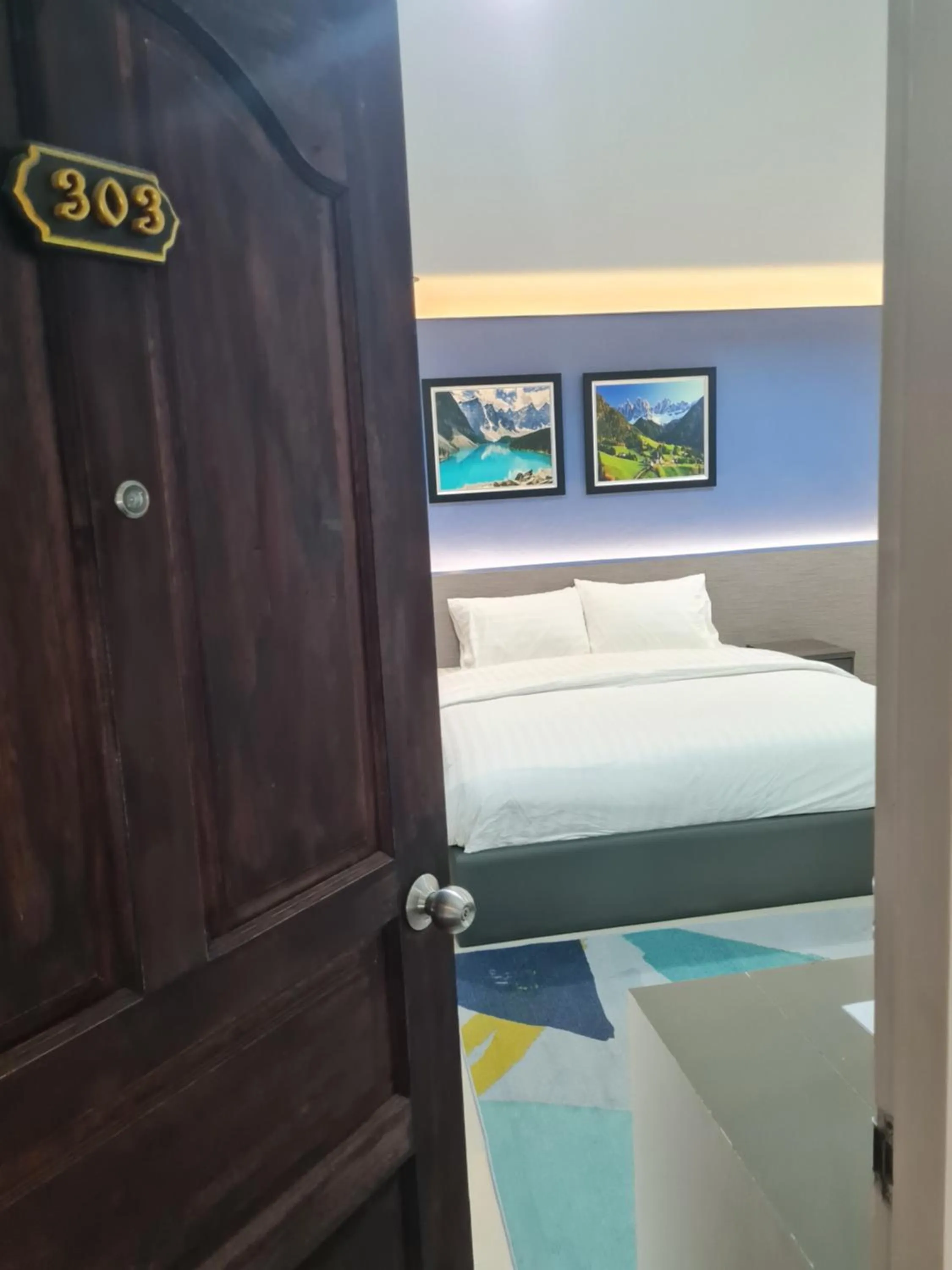 Bed in Poonsuk Place Hotel