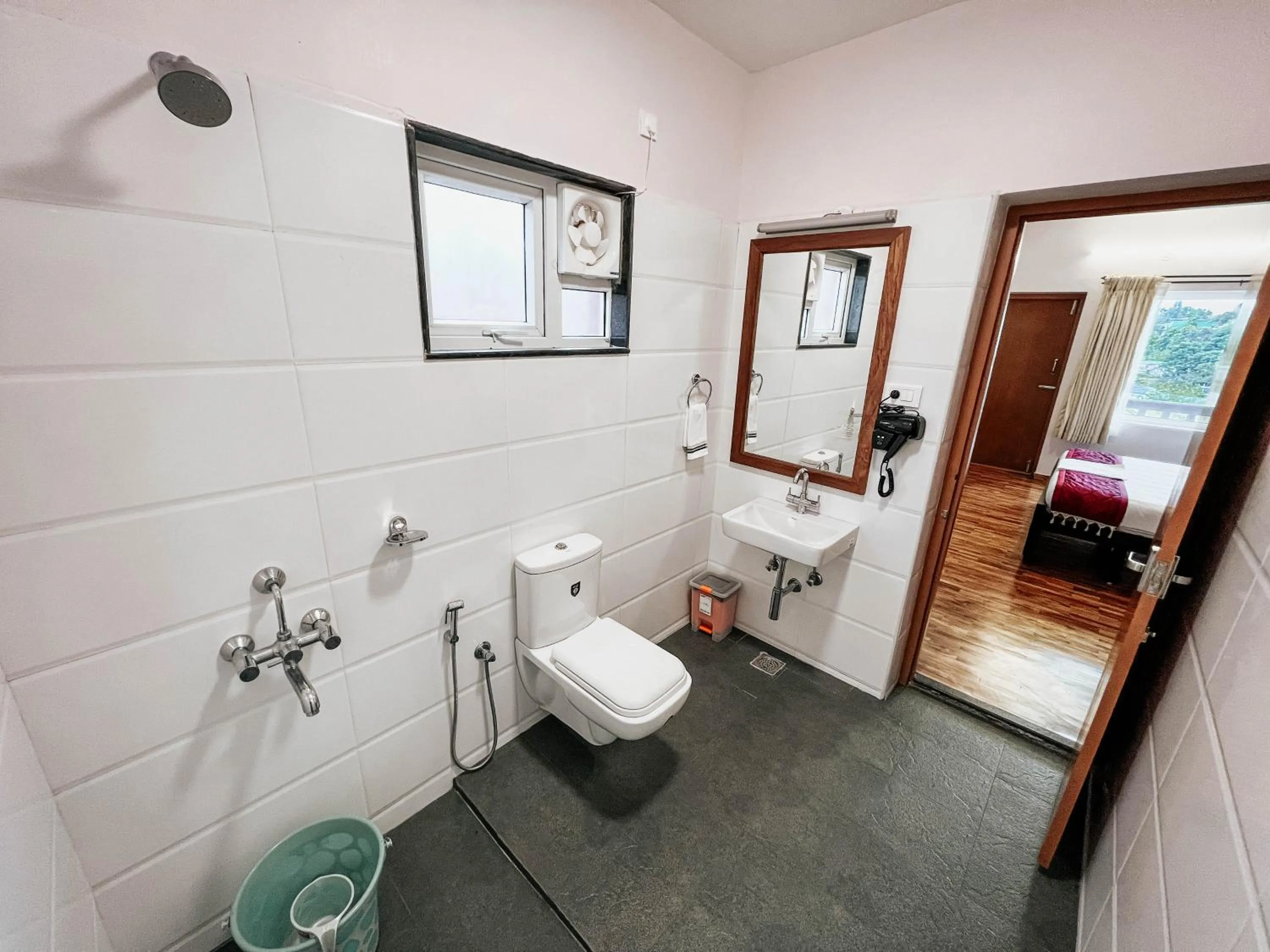 Bathroom in PURPLE ORCHID BY XACRO XPERIENCES