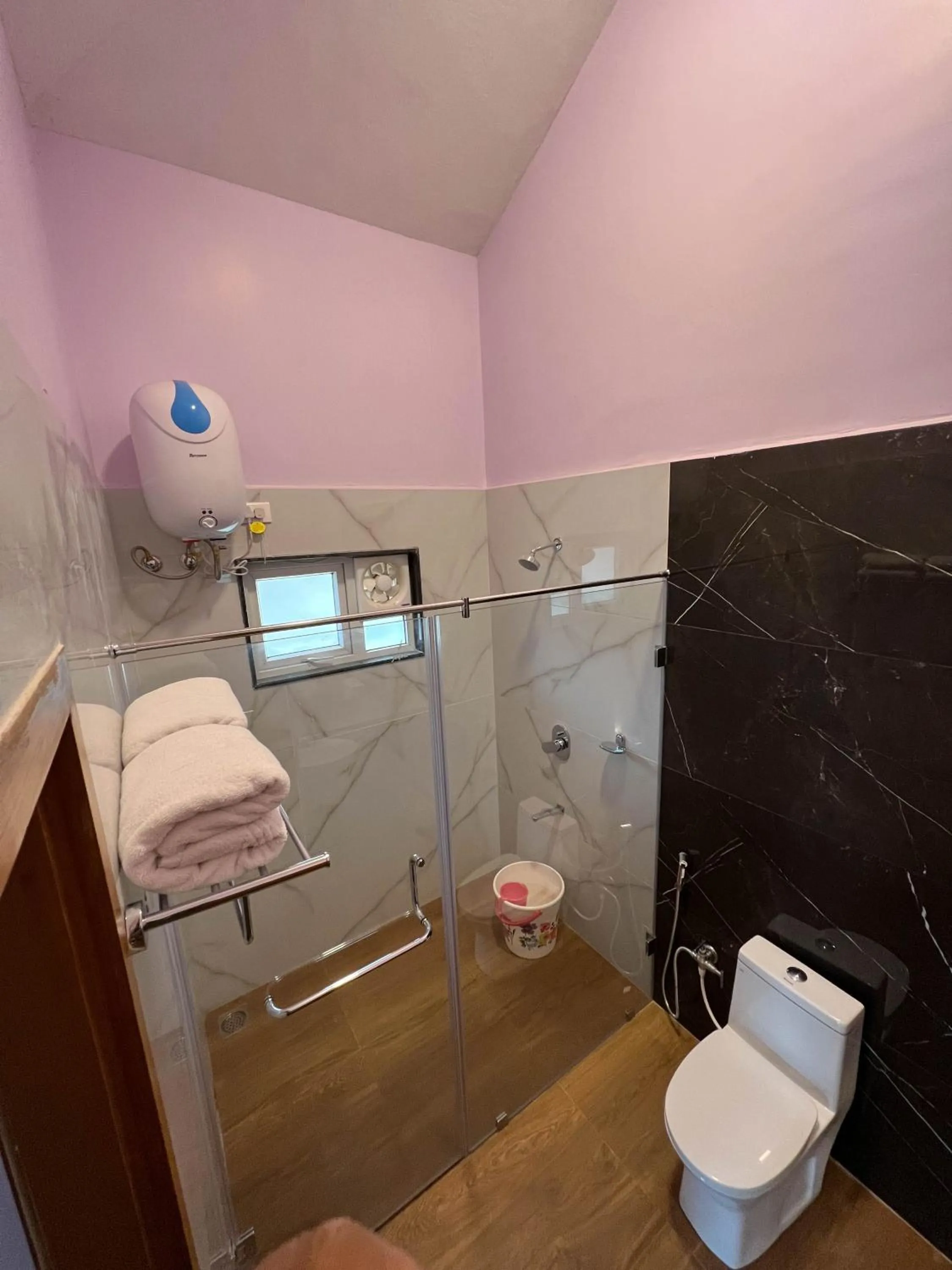 Bathroom in PURPLE ORCHID BY XACRO XPERIENCES