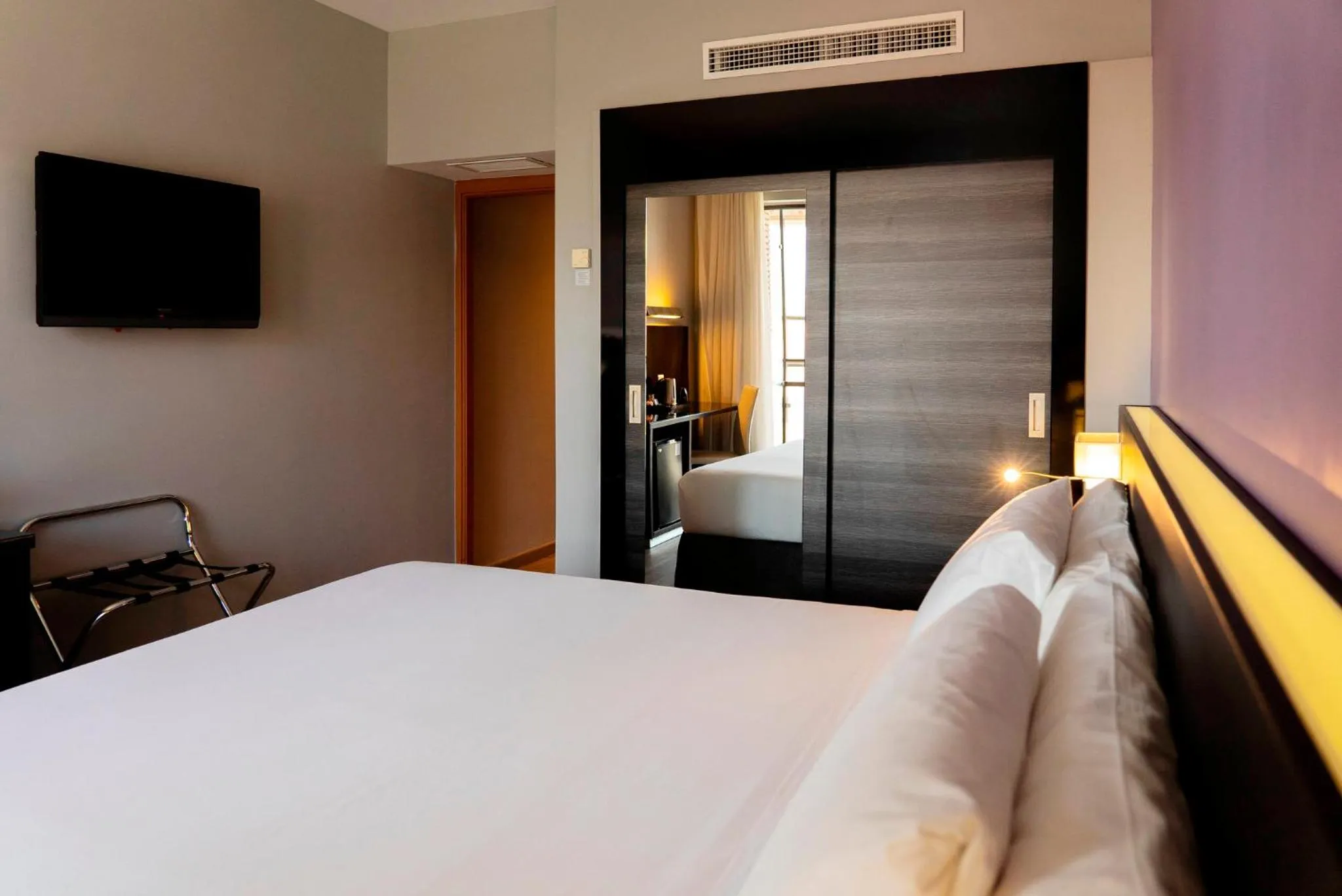 Photo of the whole room, Bed in Sercotel Córdoba Medina Azahara