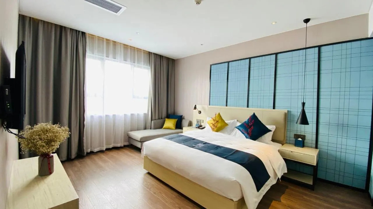 Bed in Echarm Hotel Foshan Guangfo Road Jiaokou Metro Station