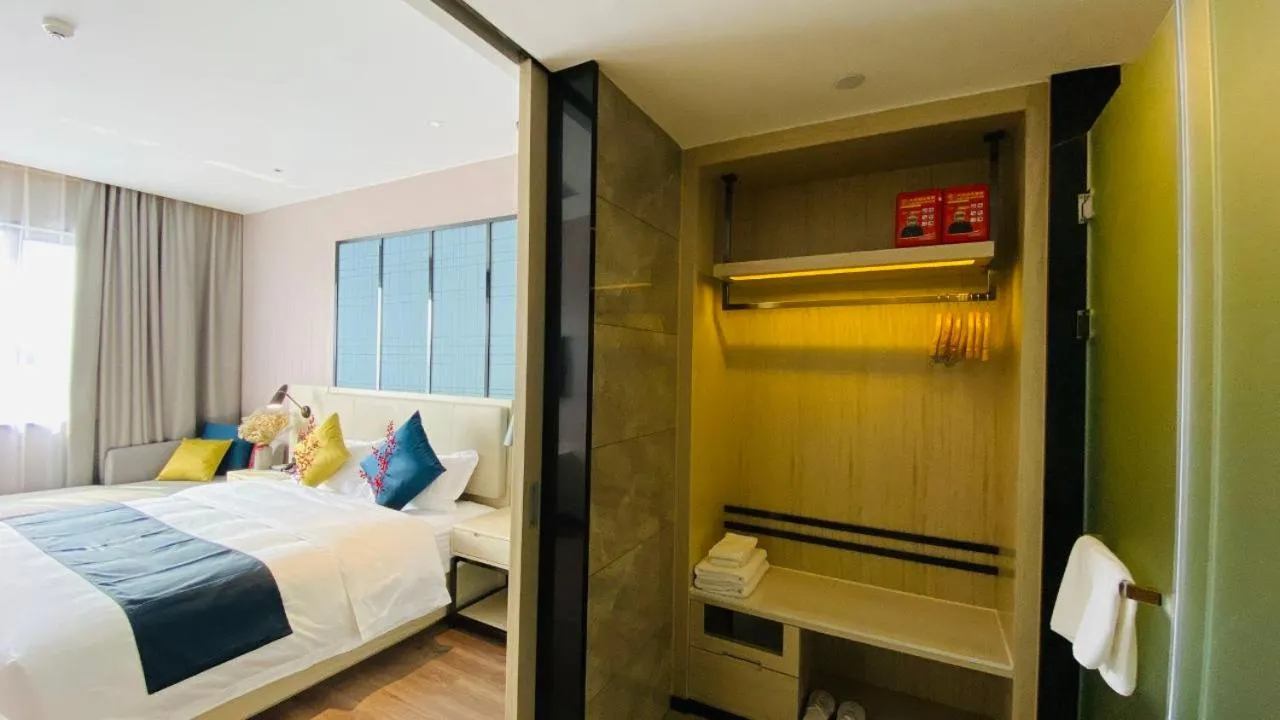 Bed in Echarm Hotel Foshan Guangfo Road Jiaokou Metro Station