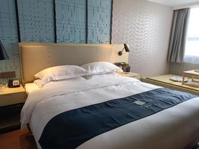 Bed in Echarm Hotel Foshan Guangfo Road Jiaokou Metro Station