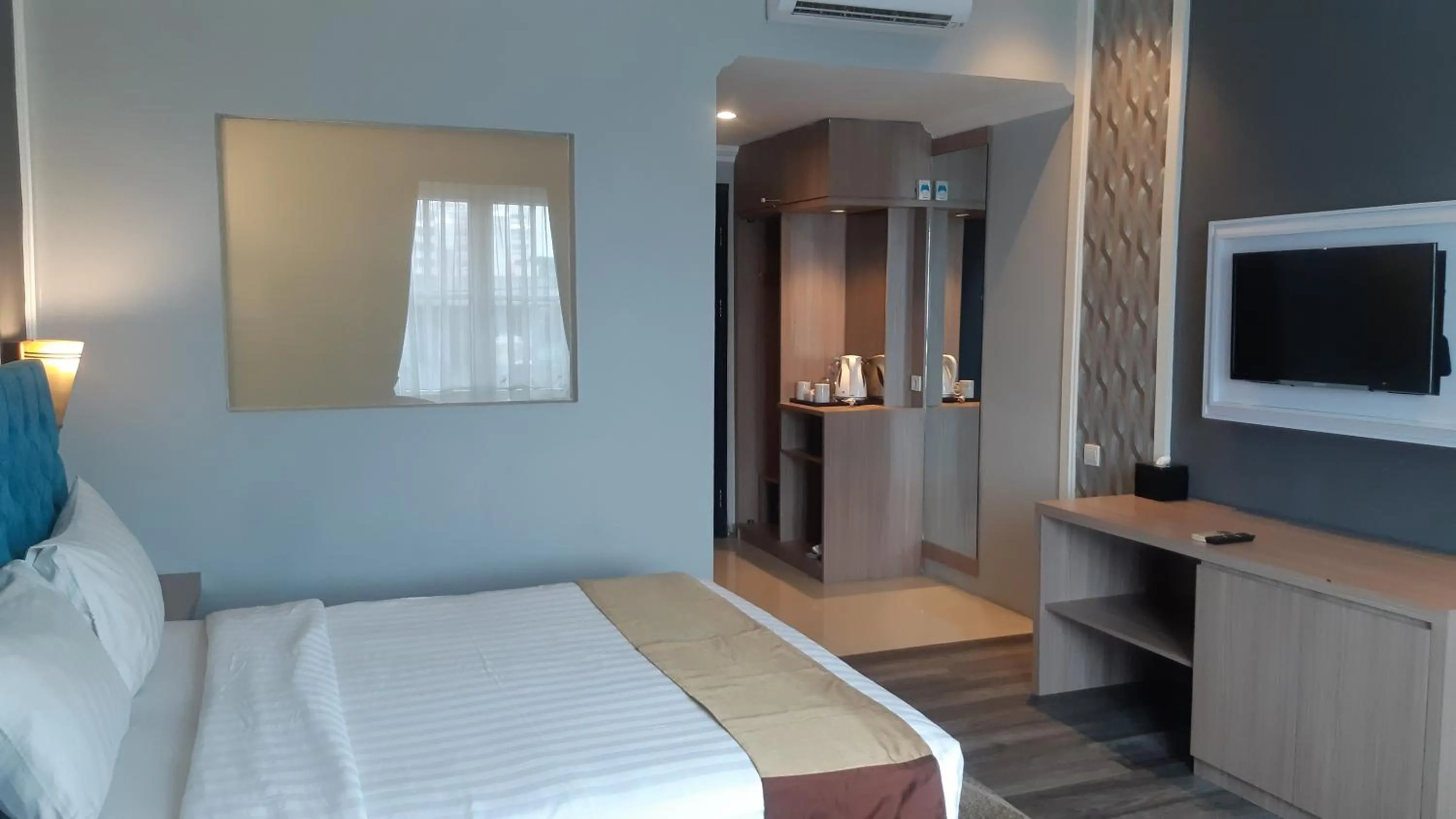 Bedroom, Bed in Luminor Hotel Palembang by WH Free Massage 10 Minutes