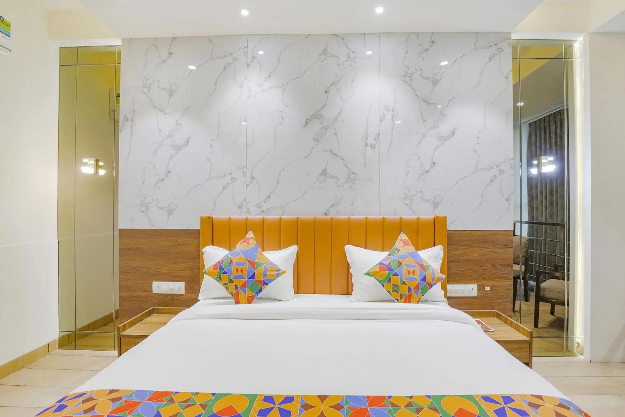 Bed in FabHotel Meritus Inn