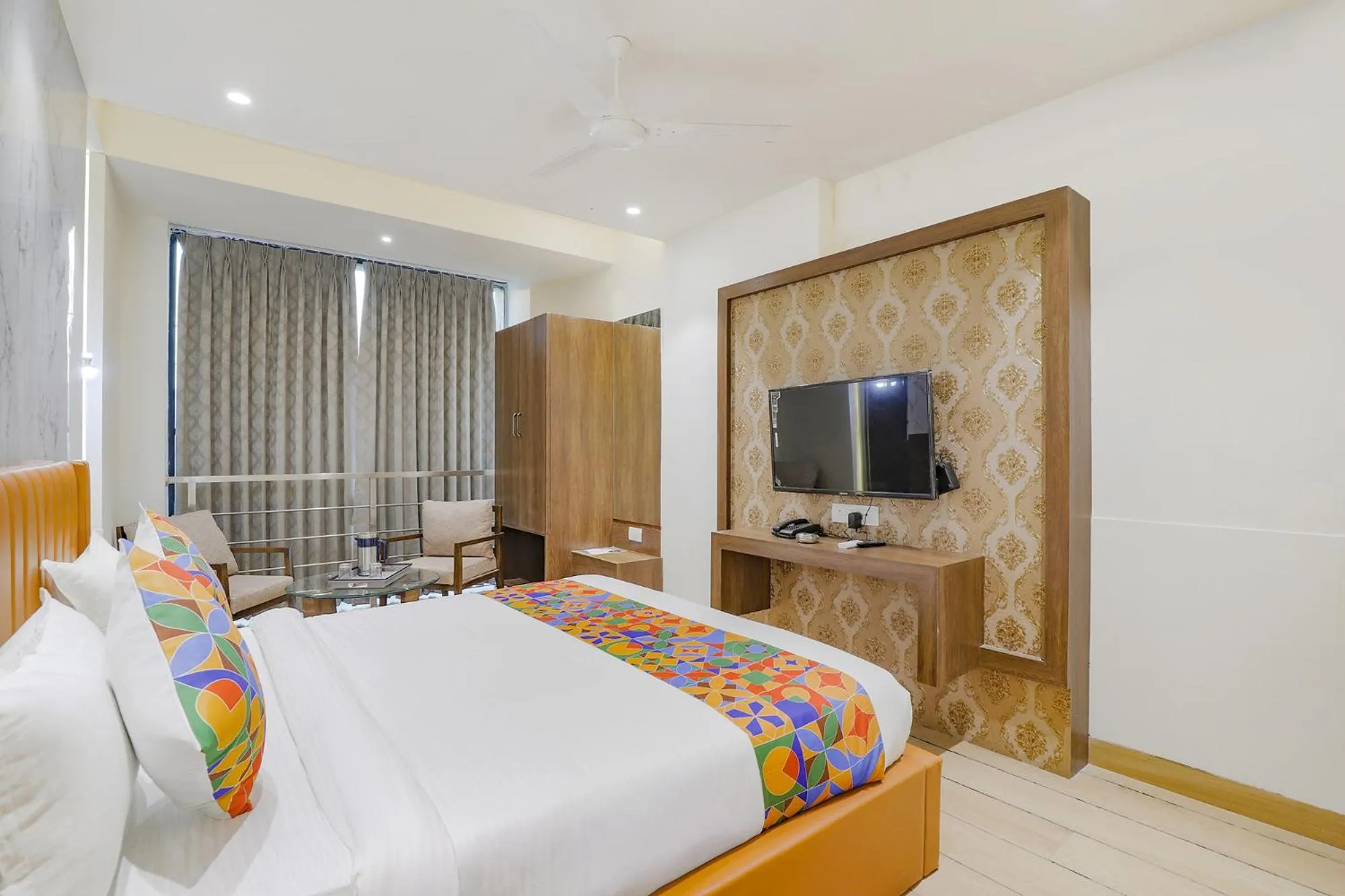 Bed in FabHotel Meritus Inn