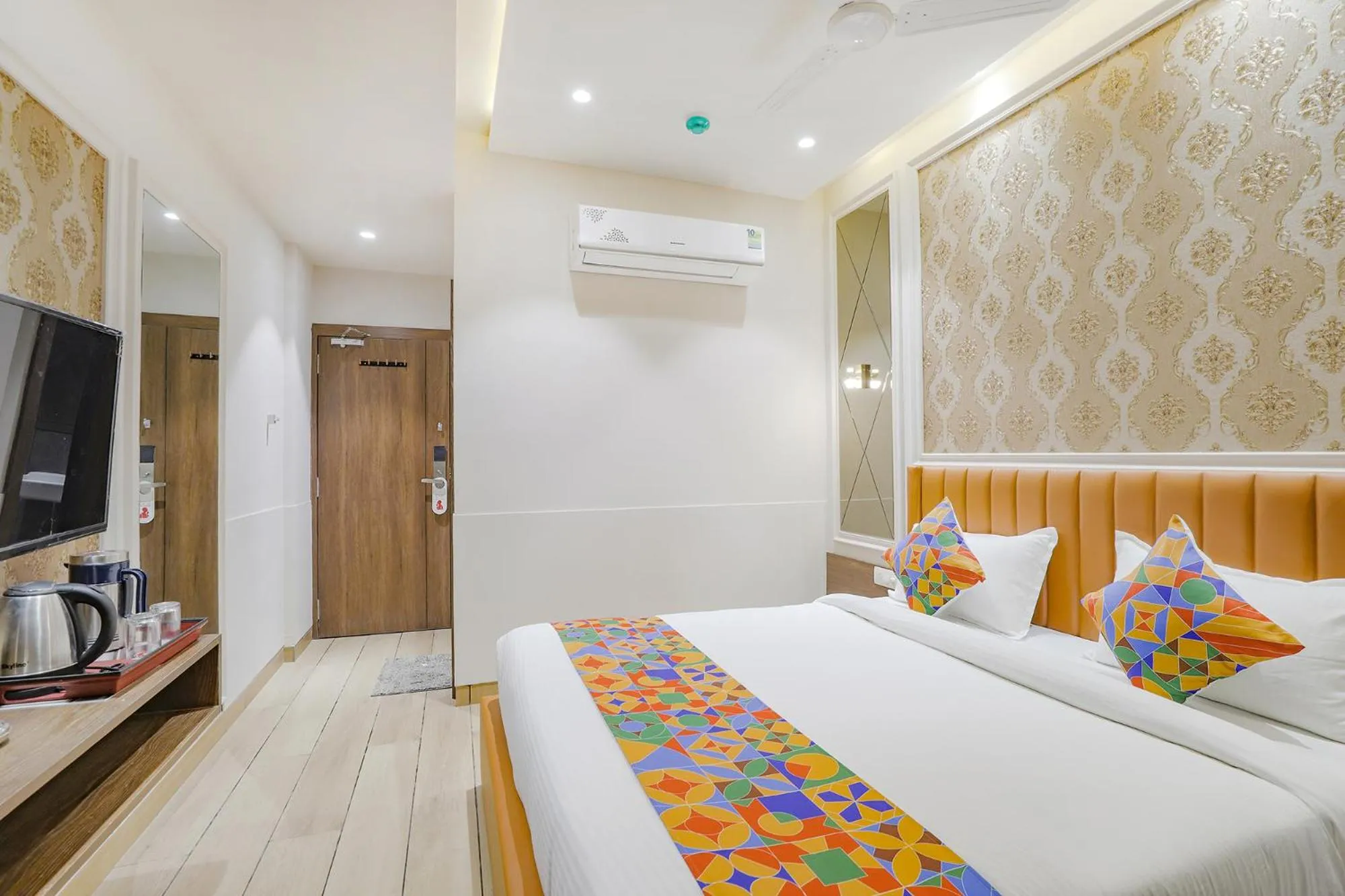 Bed in FabHotel Meritus Inn