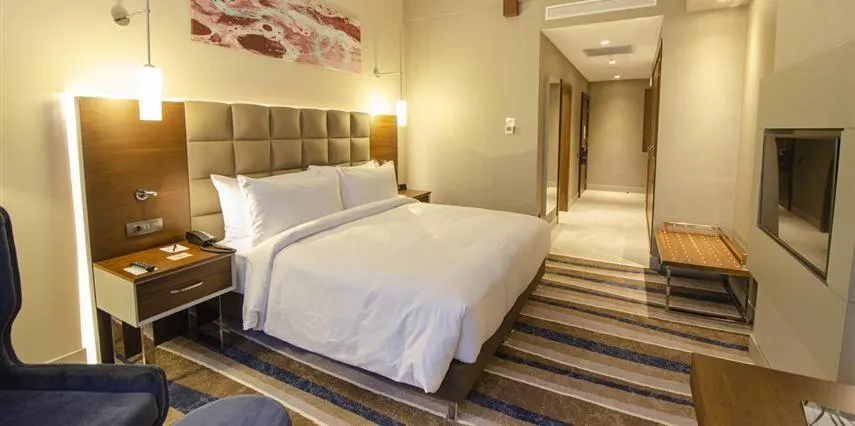 Communal lounge/ TV room, Bed in Questa Thermal & Spa Hotel