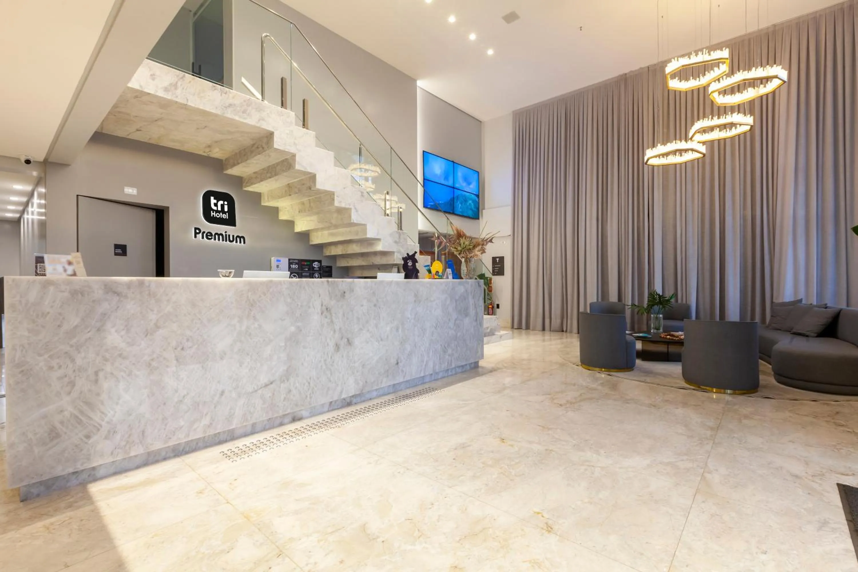 Lobby or reception in Tri Hotel Premium Itapema