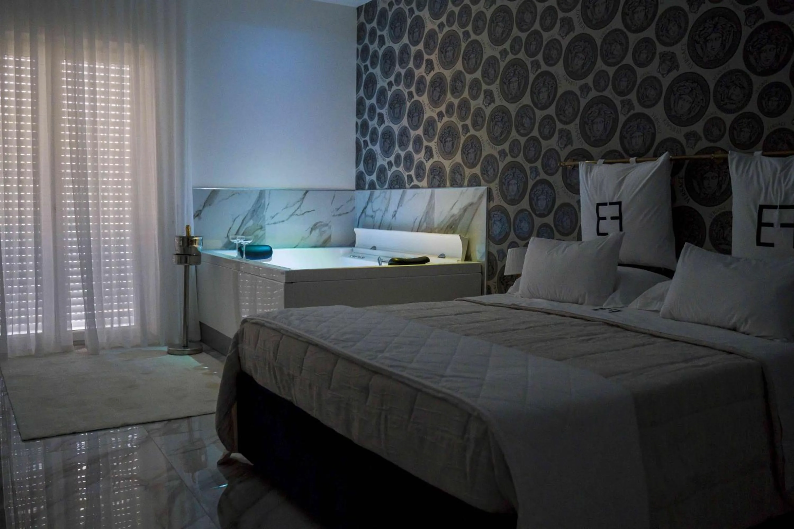 Bed in EF LUXURY LIVING RESORT AND SPA