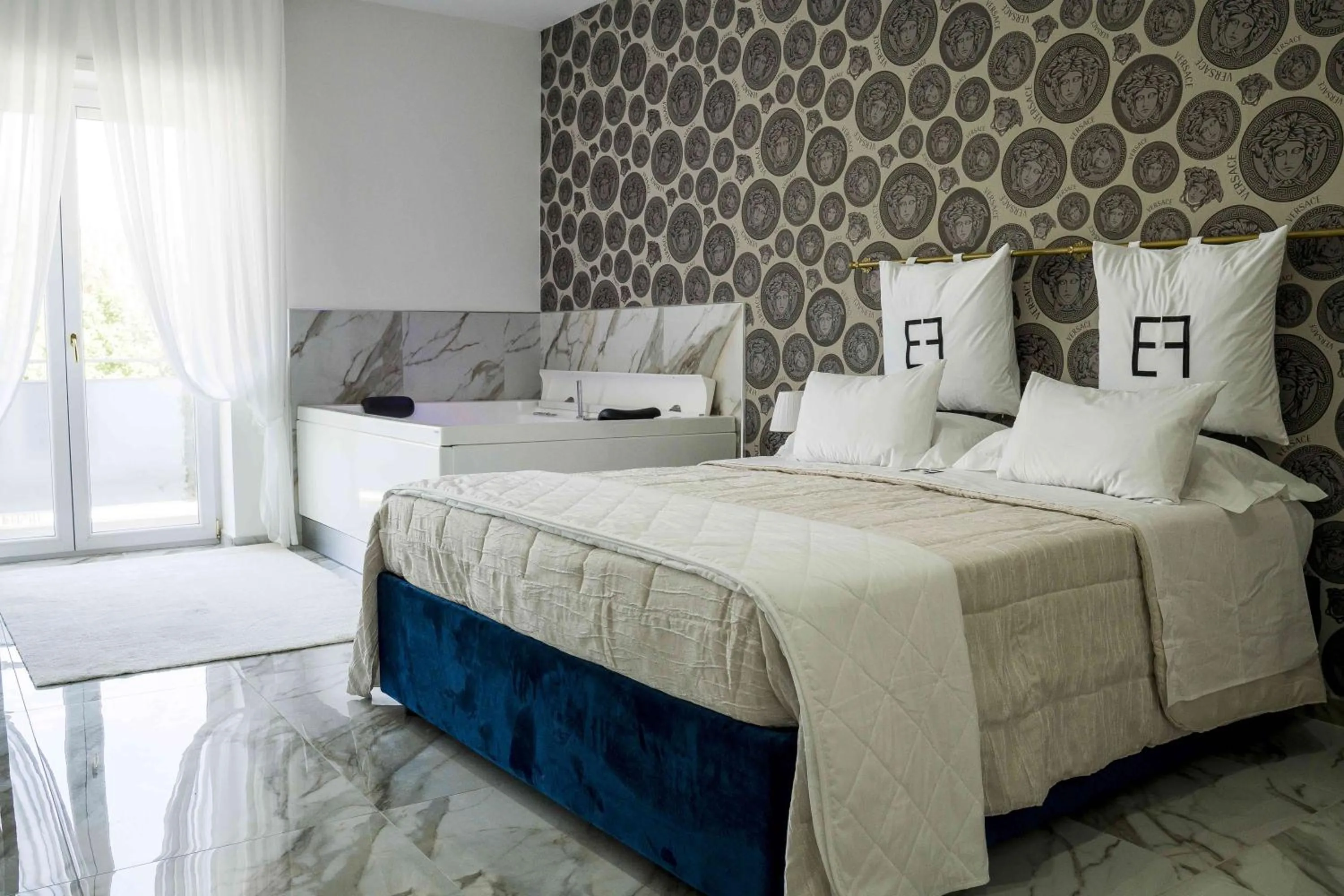 Bed in EF LUXURY LIVING RESORT AND SPA