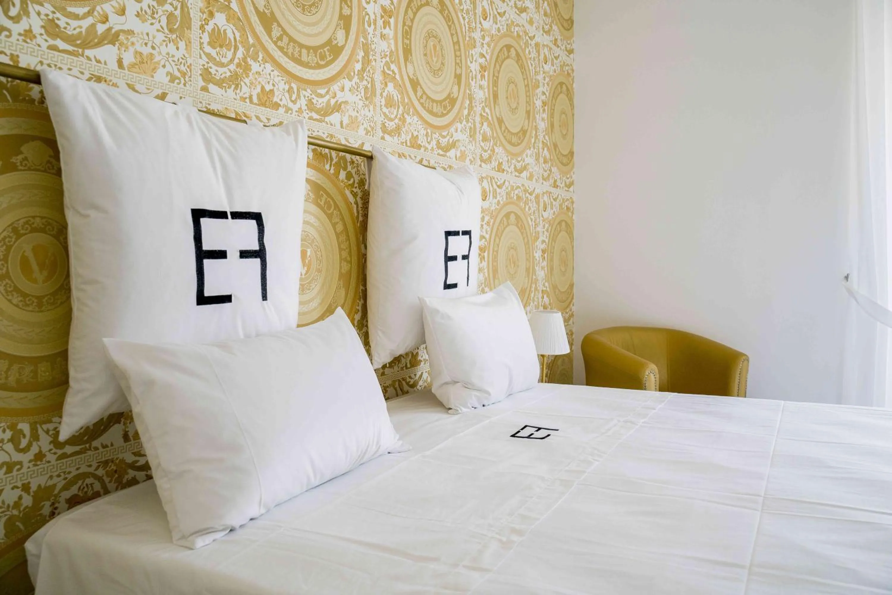 Bed in EF LUXURY LIVING RESORT AND SPA