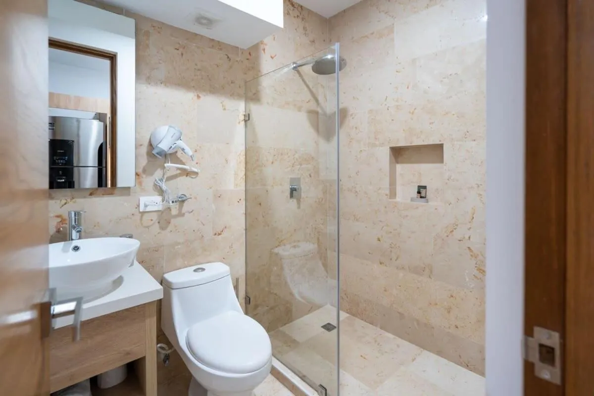 Bathroom in Oceanview Infinity Pool, Steps to 5th Ave & Beach