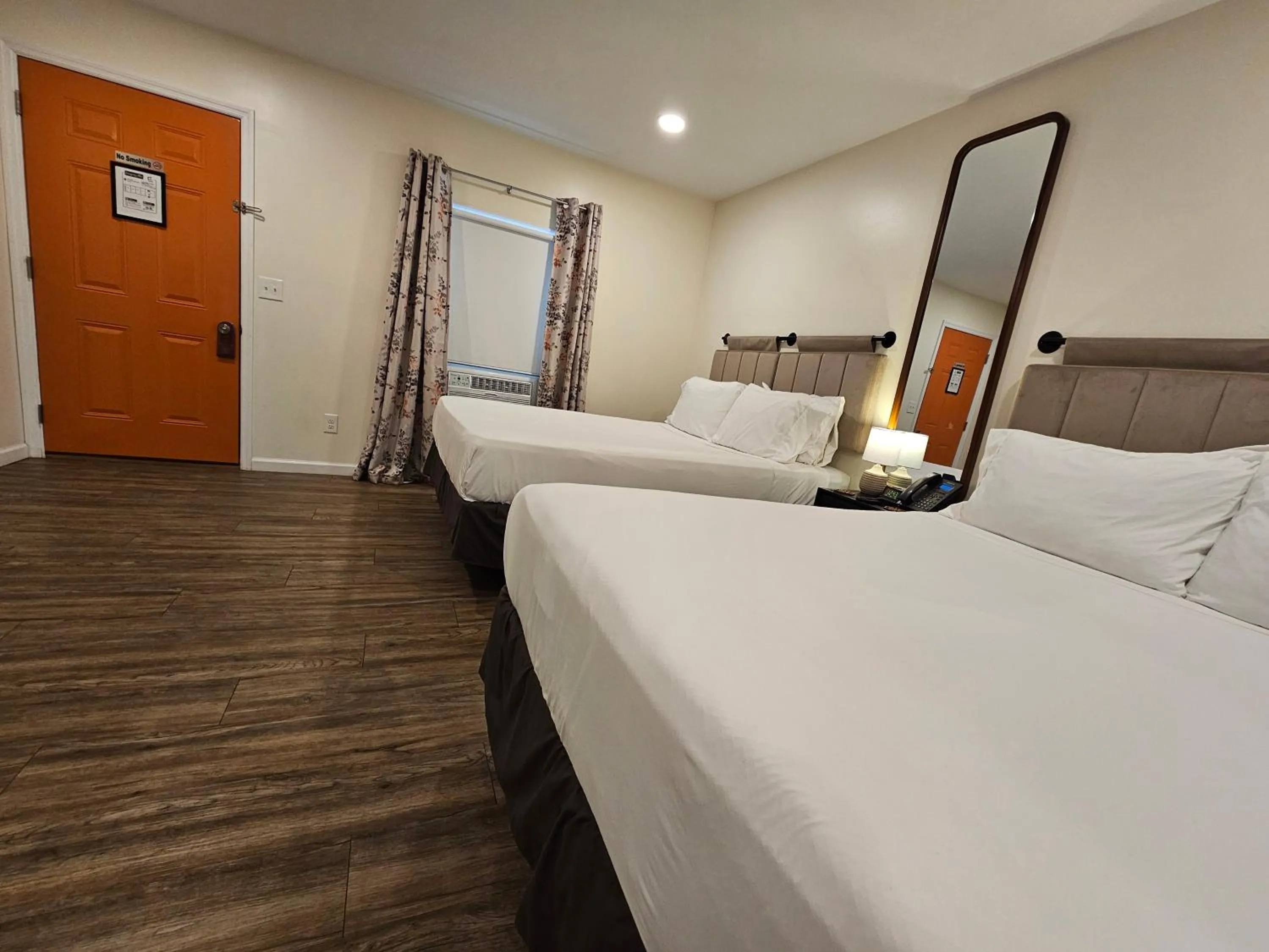 Bed in The Honey Bee Motel