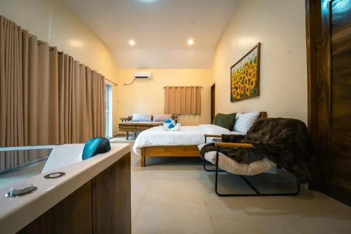 Bed in Antique Amor Bungalows & Villas