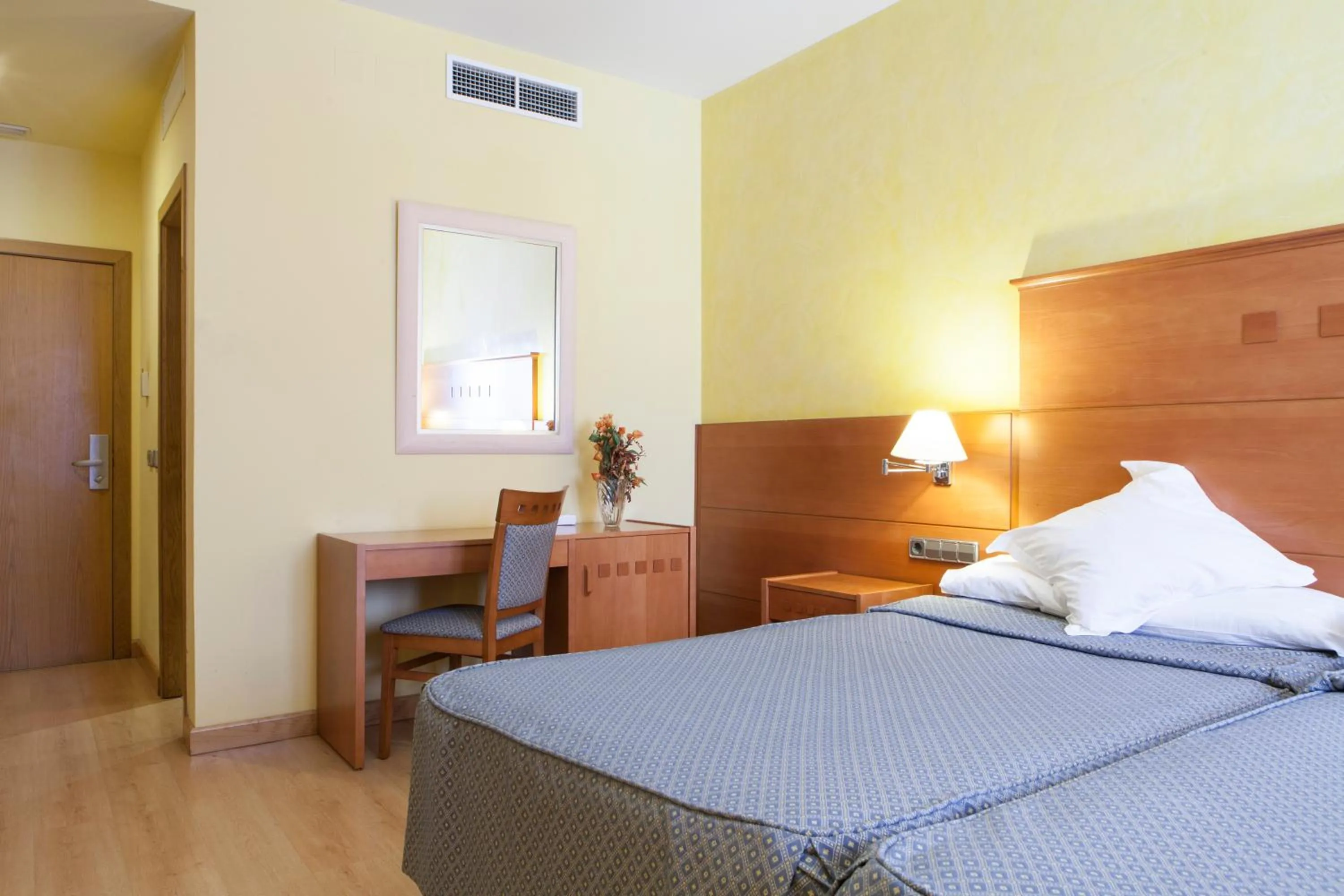 Bed in Hotel Cervantes