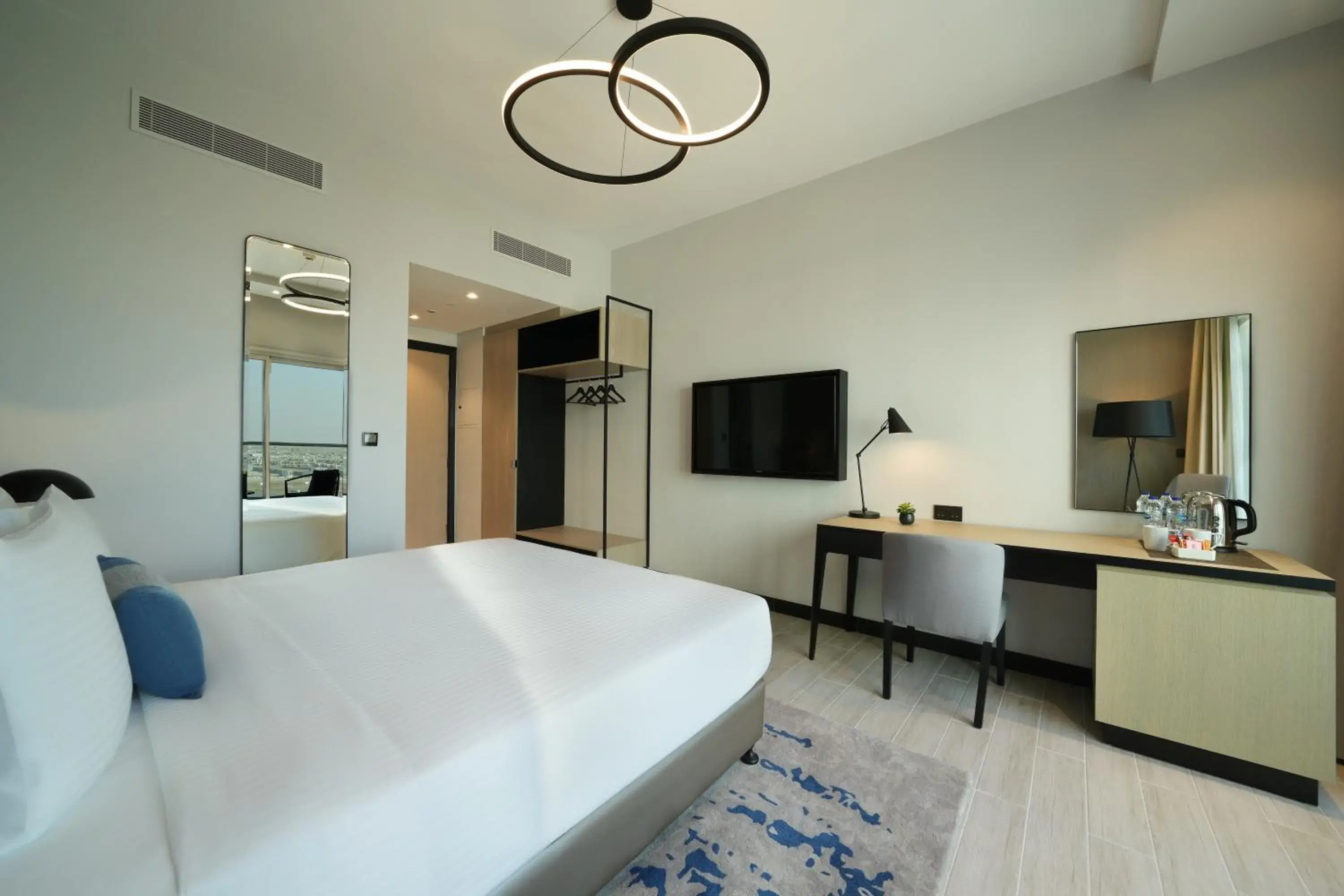 Guest Room – Twin Beds in DAMAC Hills 2 Hotel, an Edge by Rotana Hotel Guest Room – Twin Beds in DAMAC Hills 2 Hotel, an Edge by Rotana Hotel