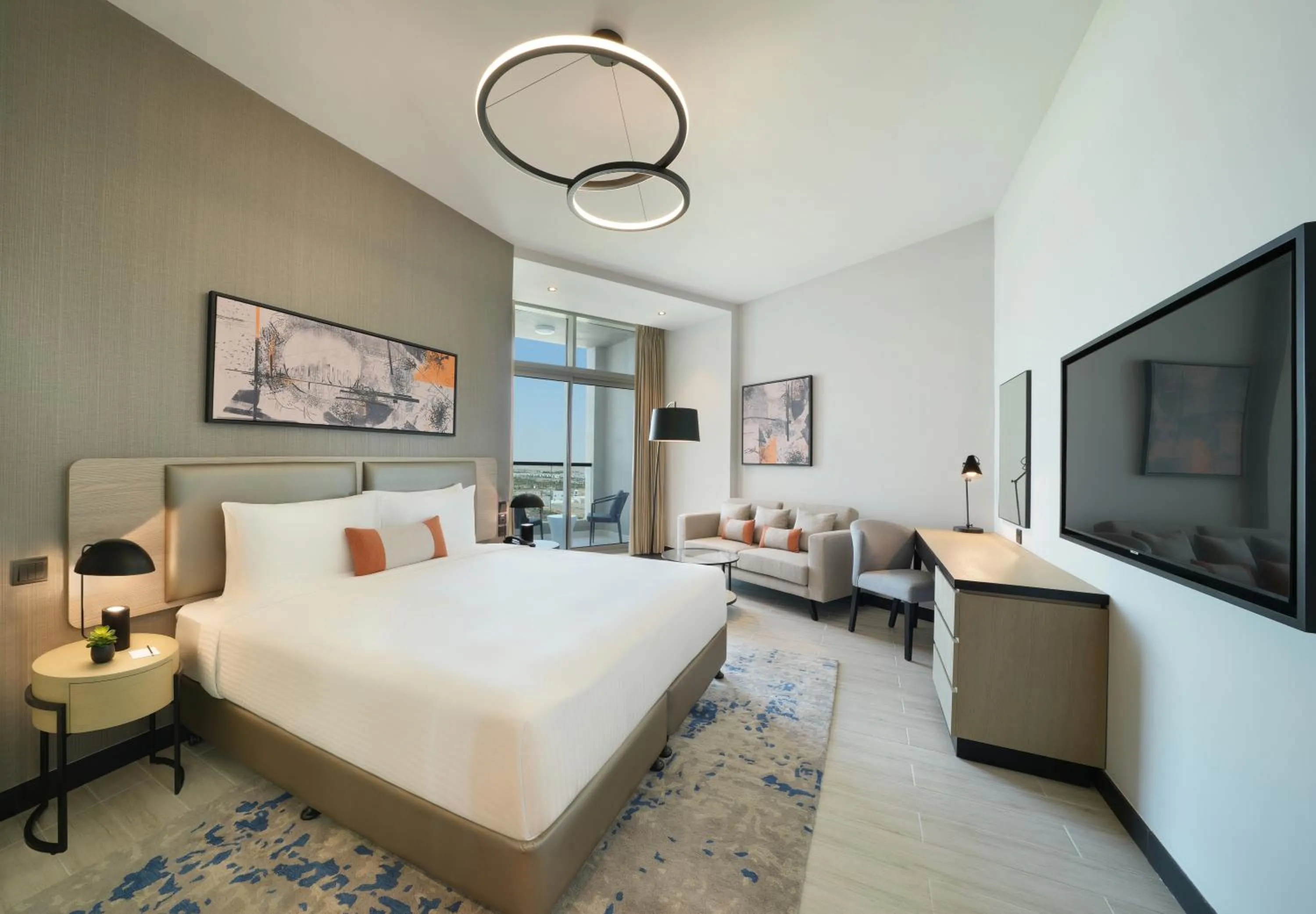 Bed in DAMAC Hills 2 Hotel, an Edge by Rotana Hotel