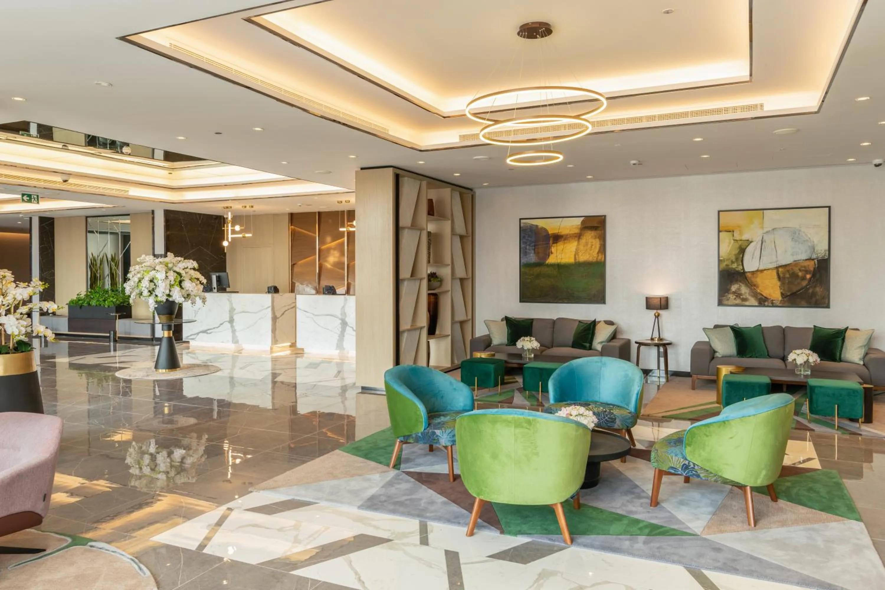 Lobby or reception in DAMAC Hills 2 Hotel, an Edge by Rotana Hotel