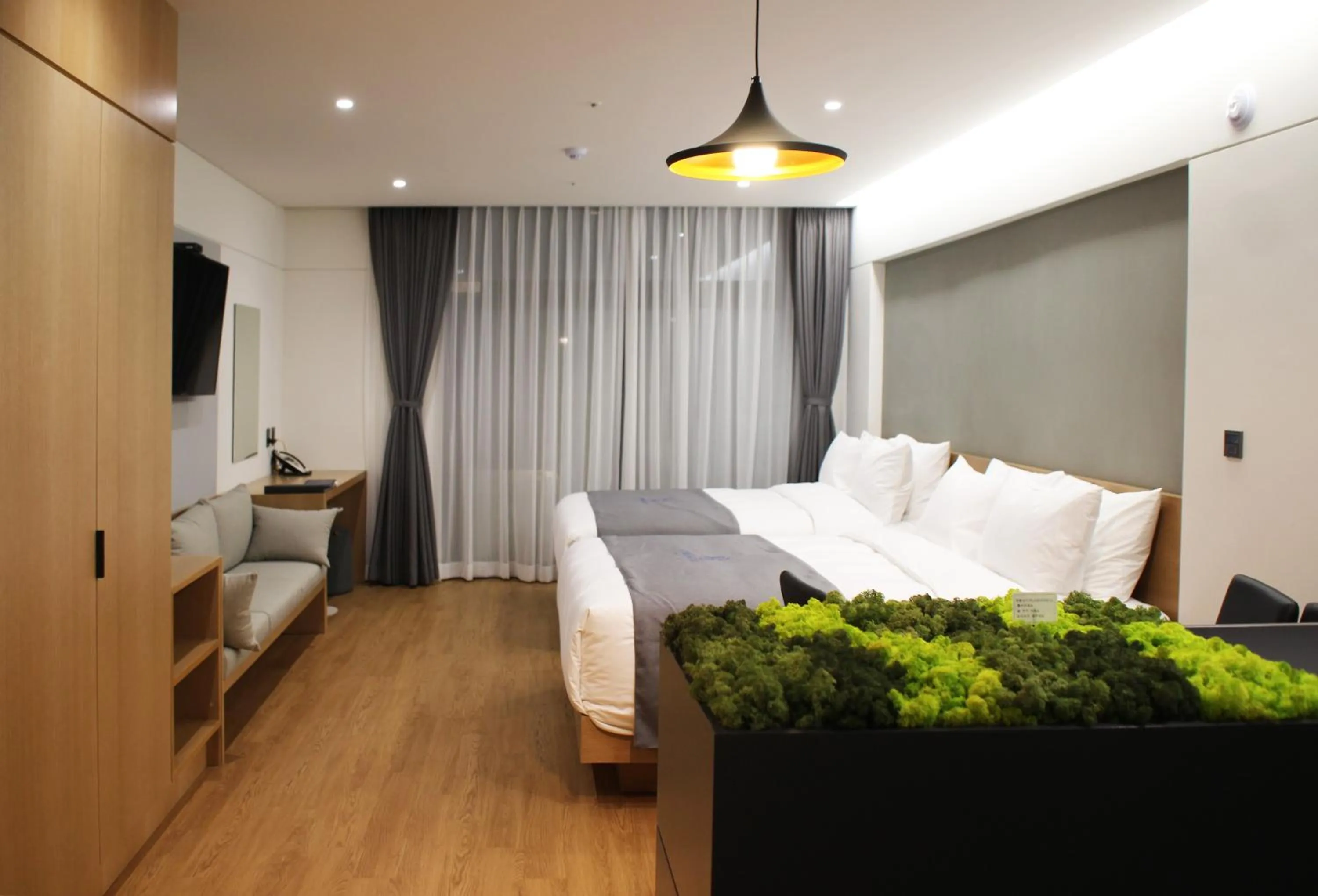 Bed in Hotel Parangvue