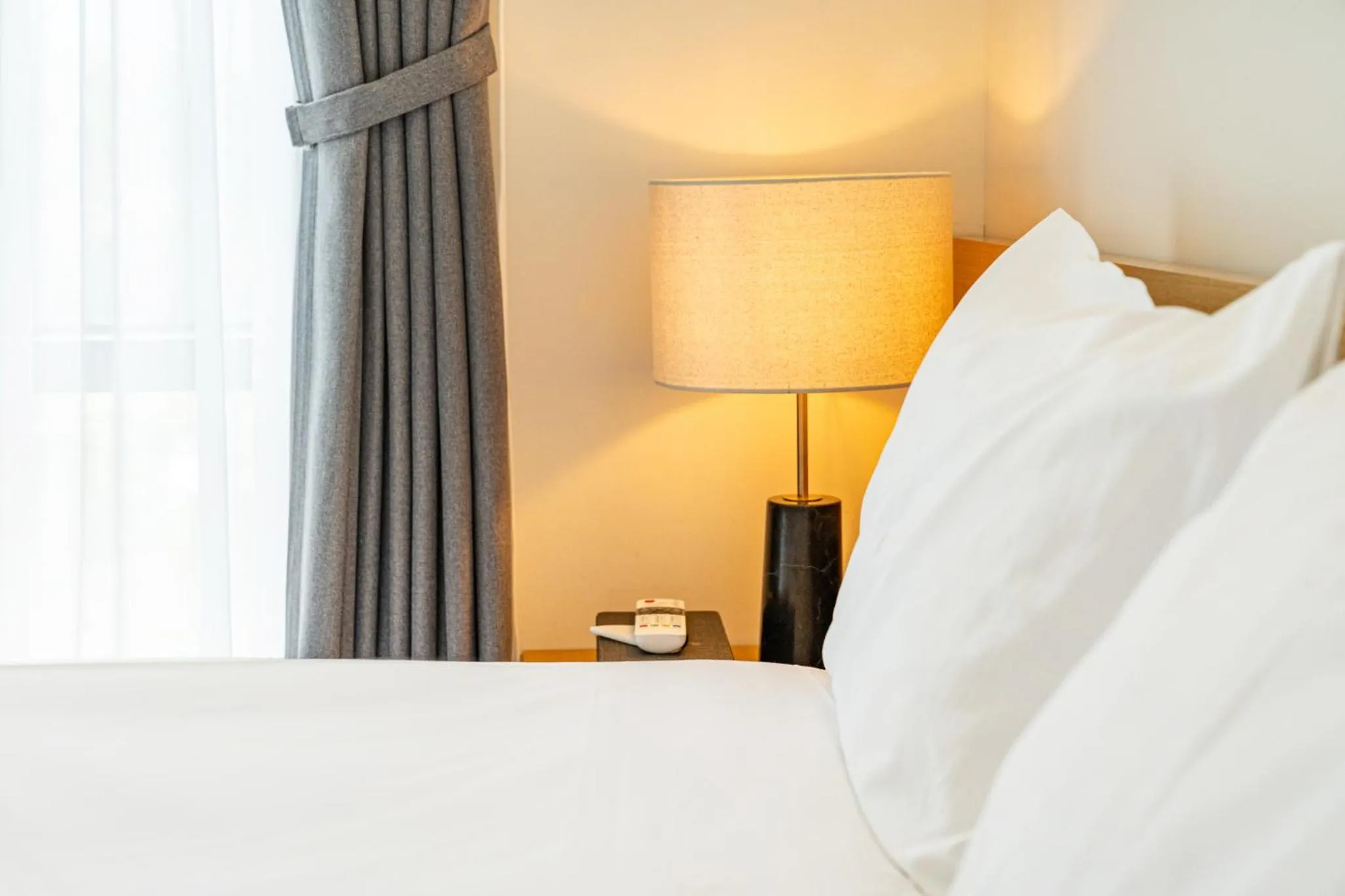 Bed in Hotel Parangvue