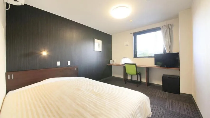 Bed in Hotel Coonel Inn